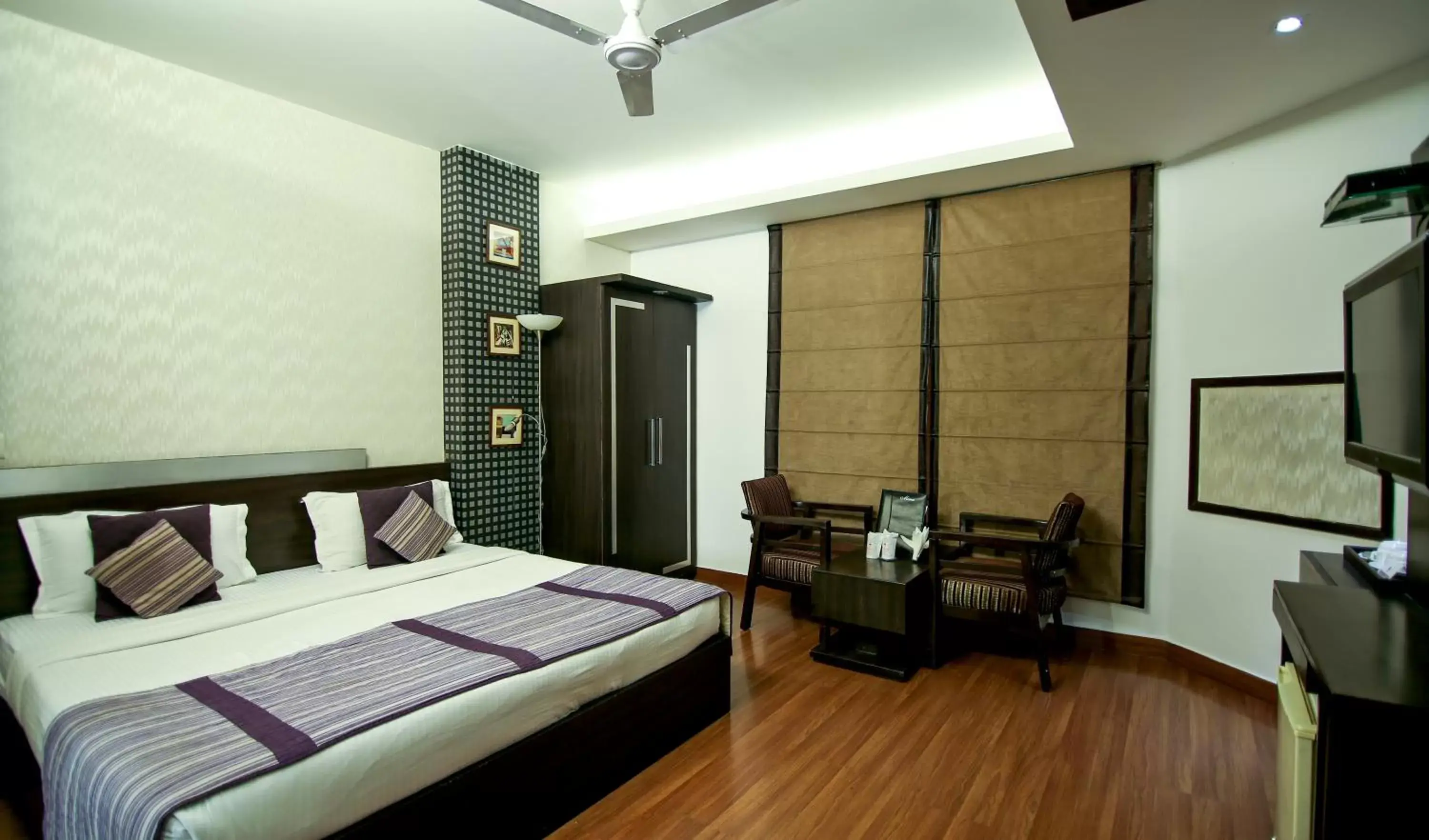 Bedroom in The Prime Balaji Deluxe @ New Delhi Railway Station