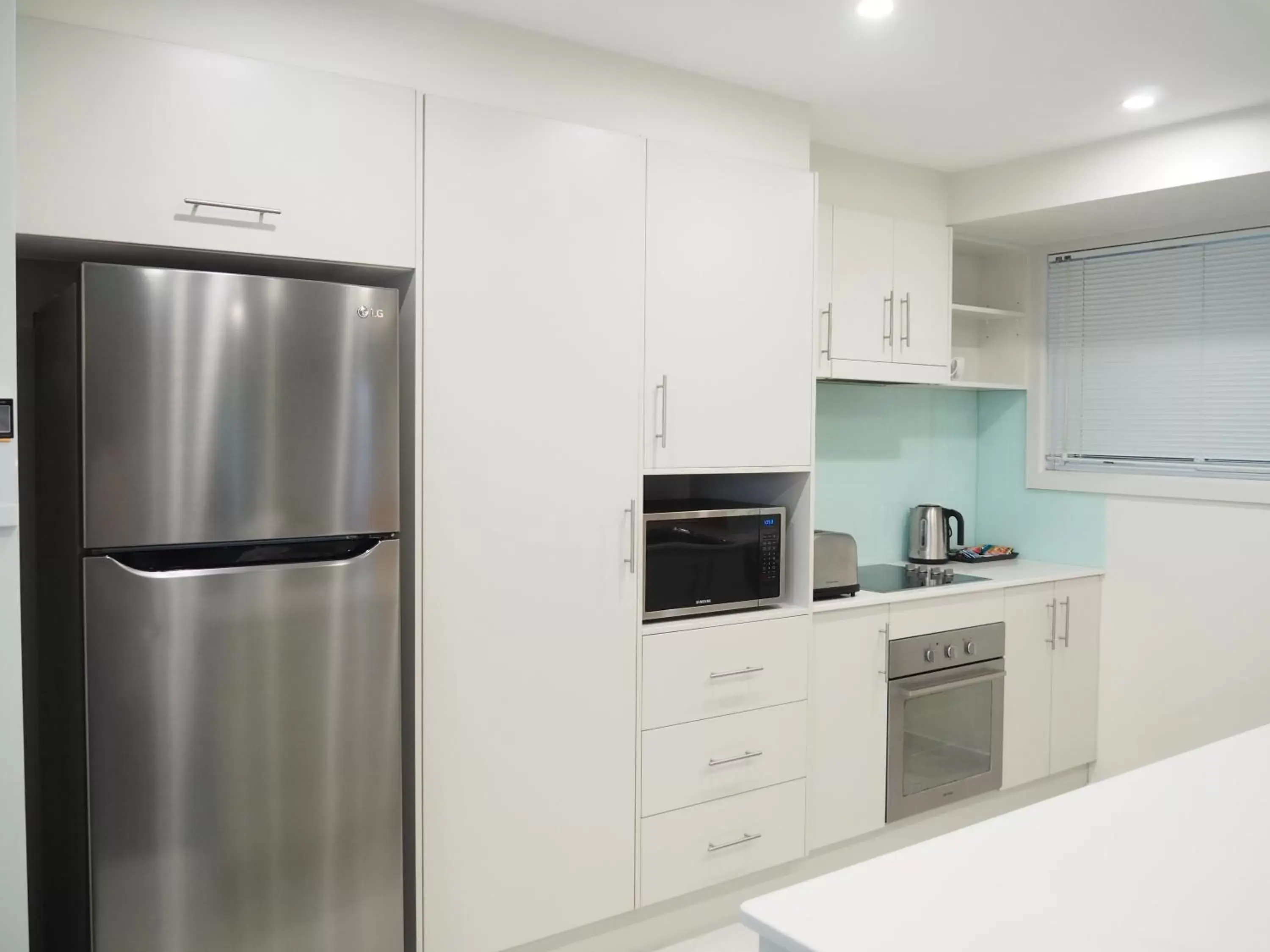 Kitchen or kitchenette, Kitchen/Kitchenette in Warners Bay Apartments