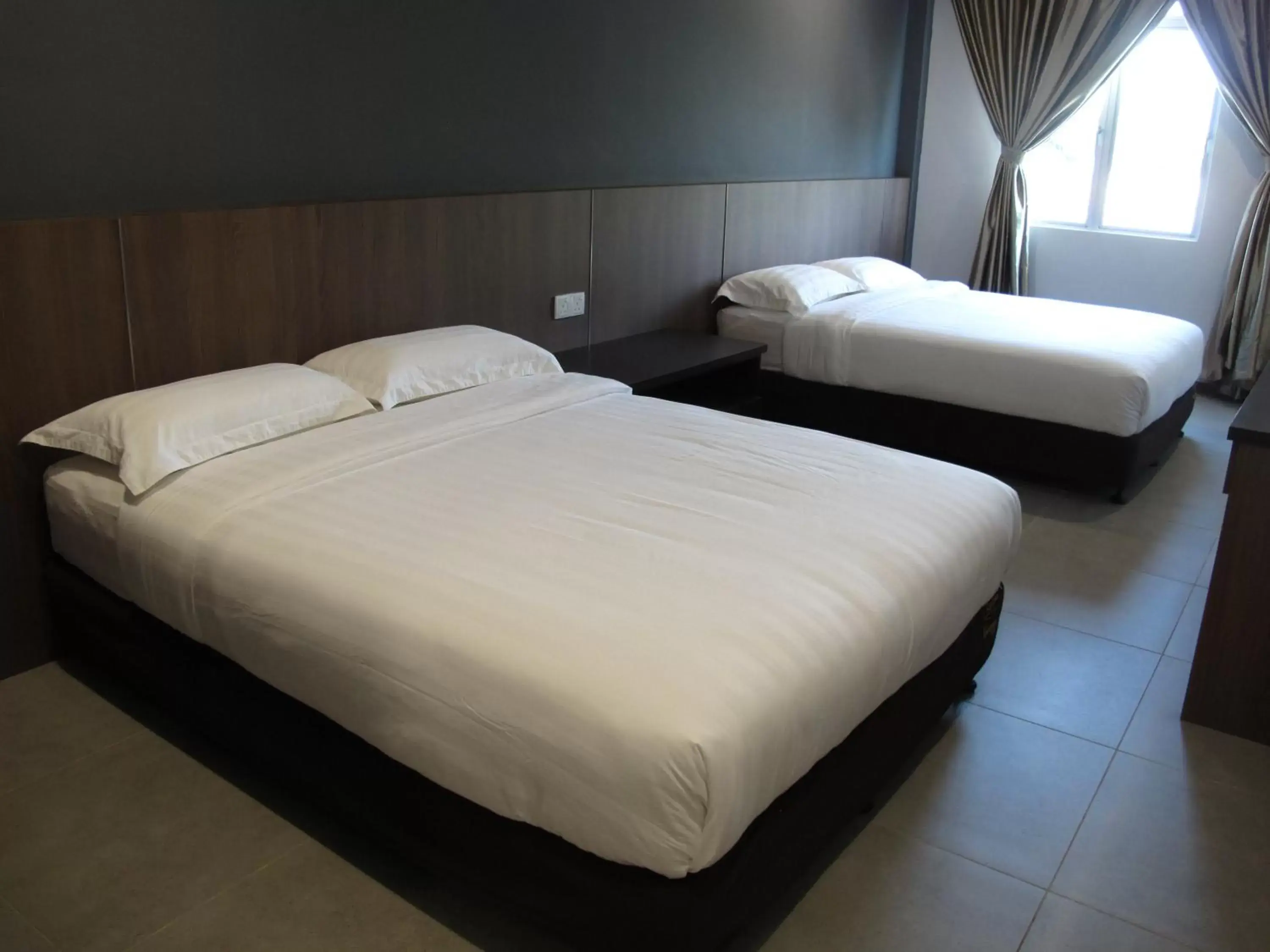 Bed in HOTEL SUKARAMAI