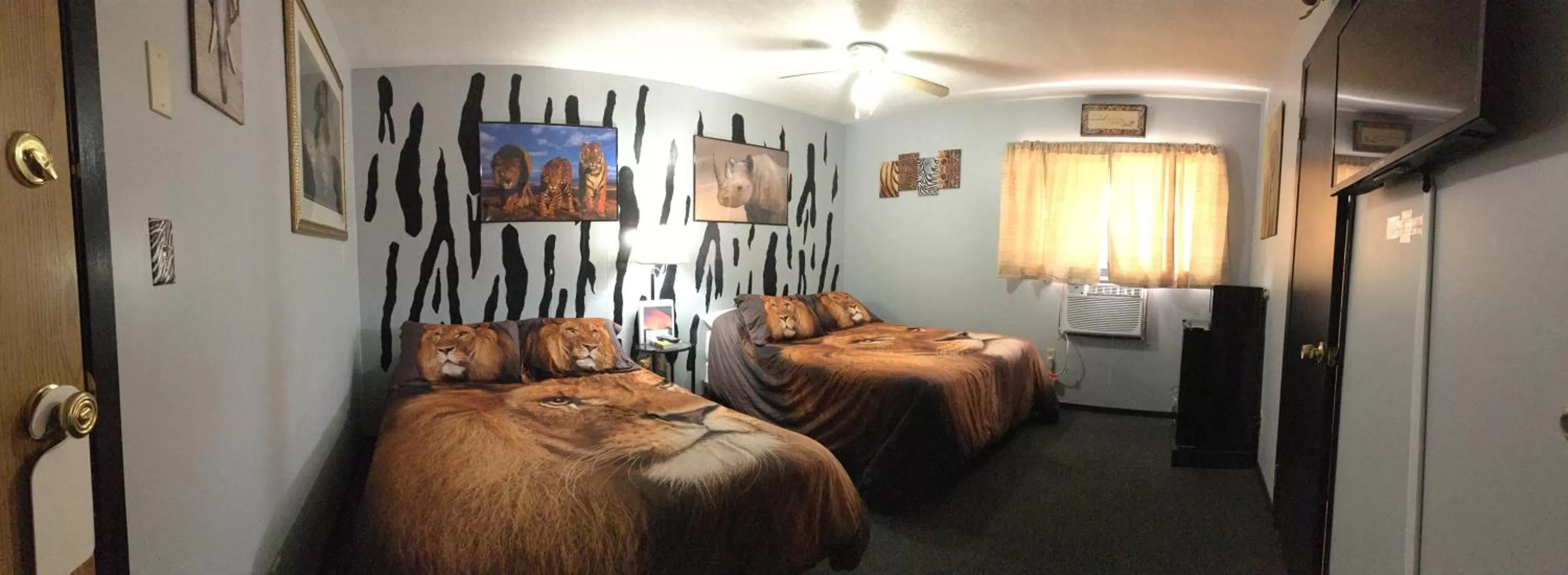 Bed in Sunset View Inn L.L.C