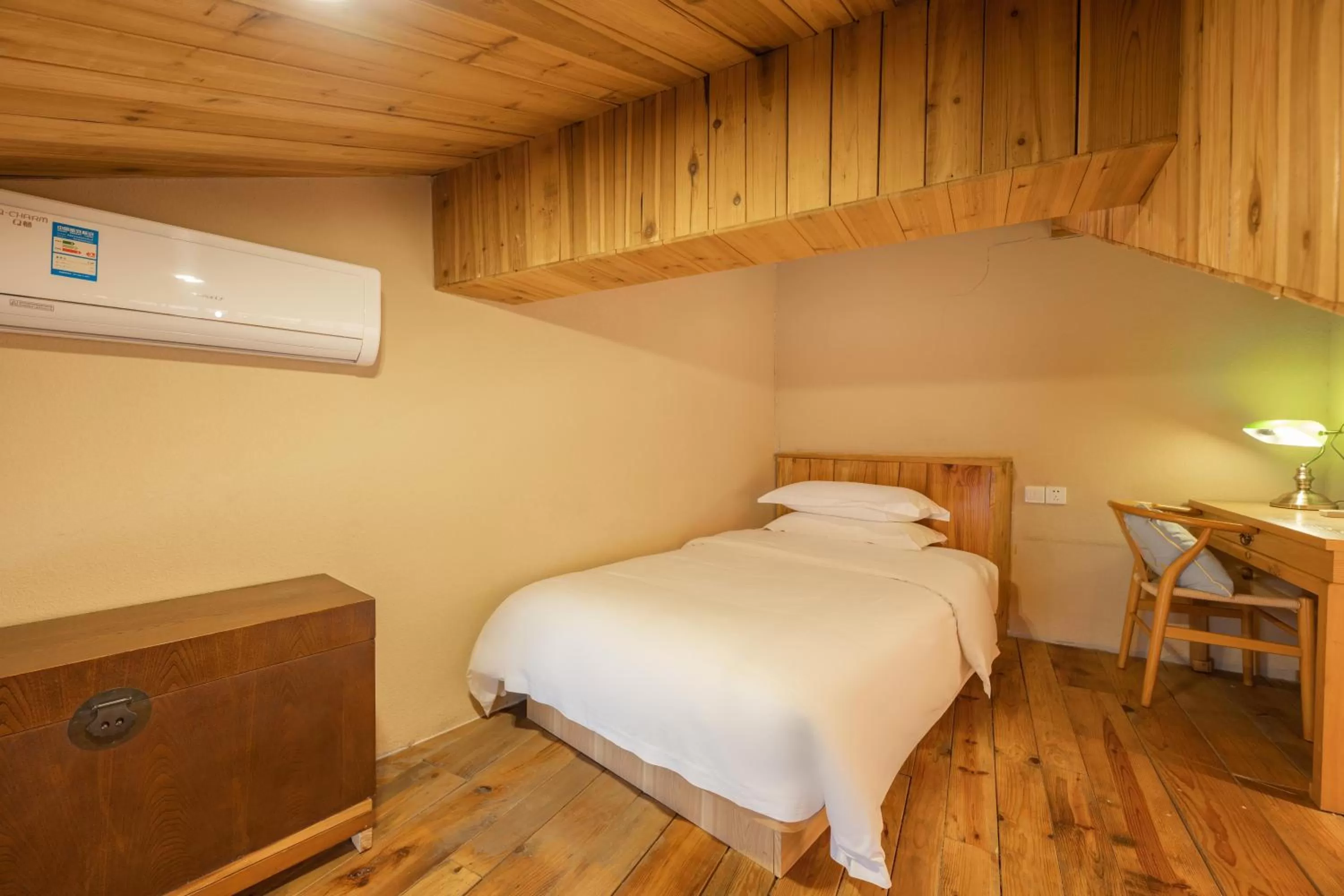 Bed in Mild Spring Boutique Hotel