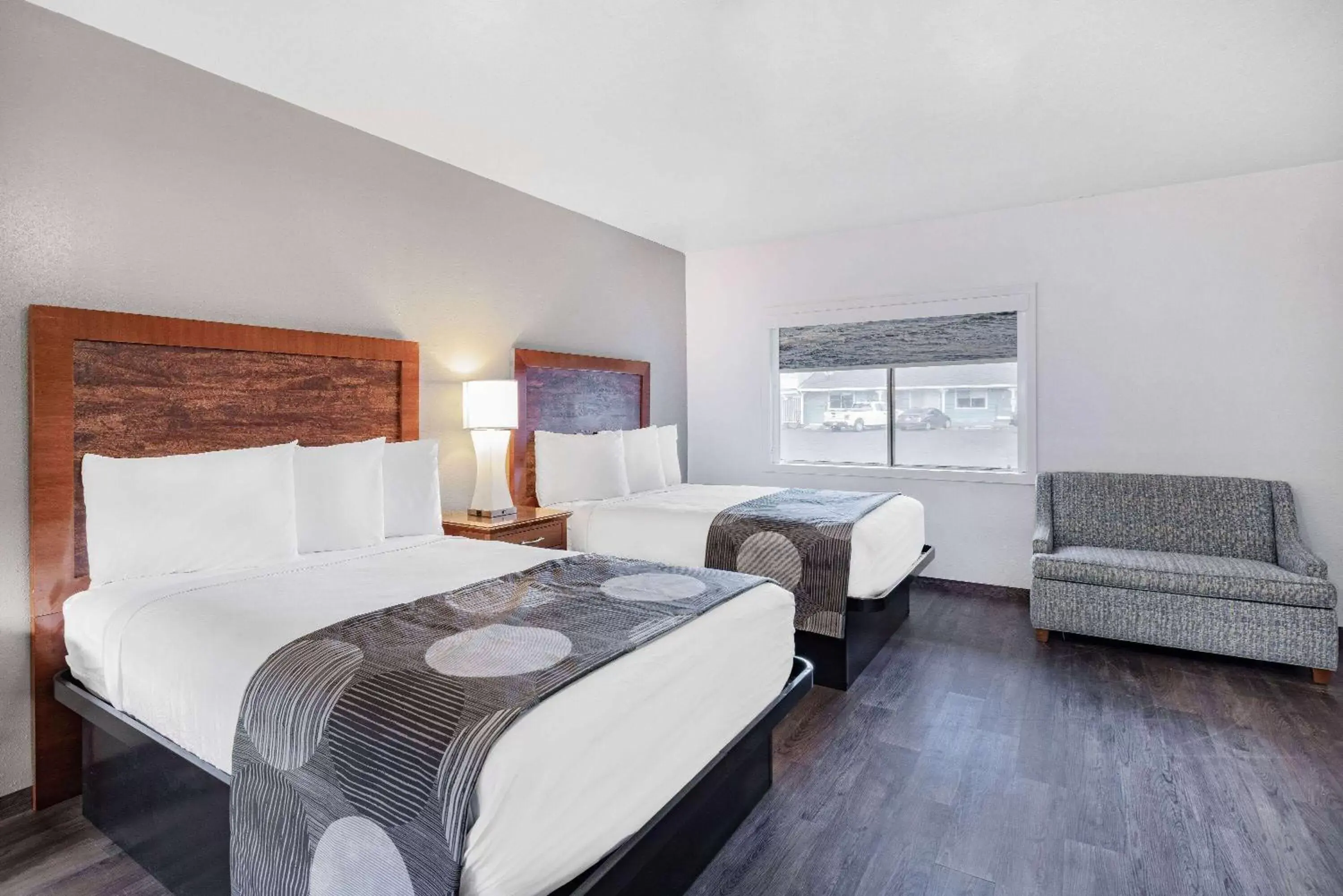 Photo of the whole room, Bed in Oceanside Inn & Suites, a Days Inn by Wyndham Photo of the whole room, Bed in Oceanside Inn & Suites, a Days Inn by Wyndham