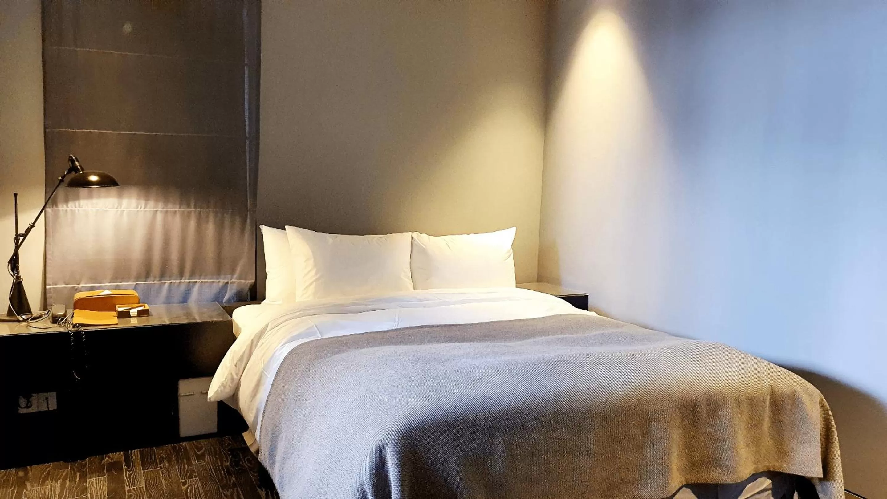 Bed in JS Boutique Hotel