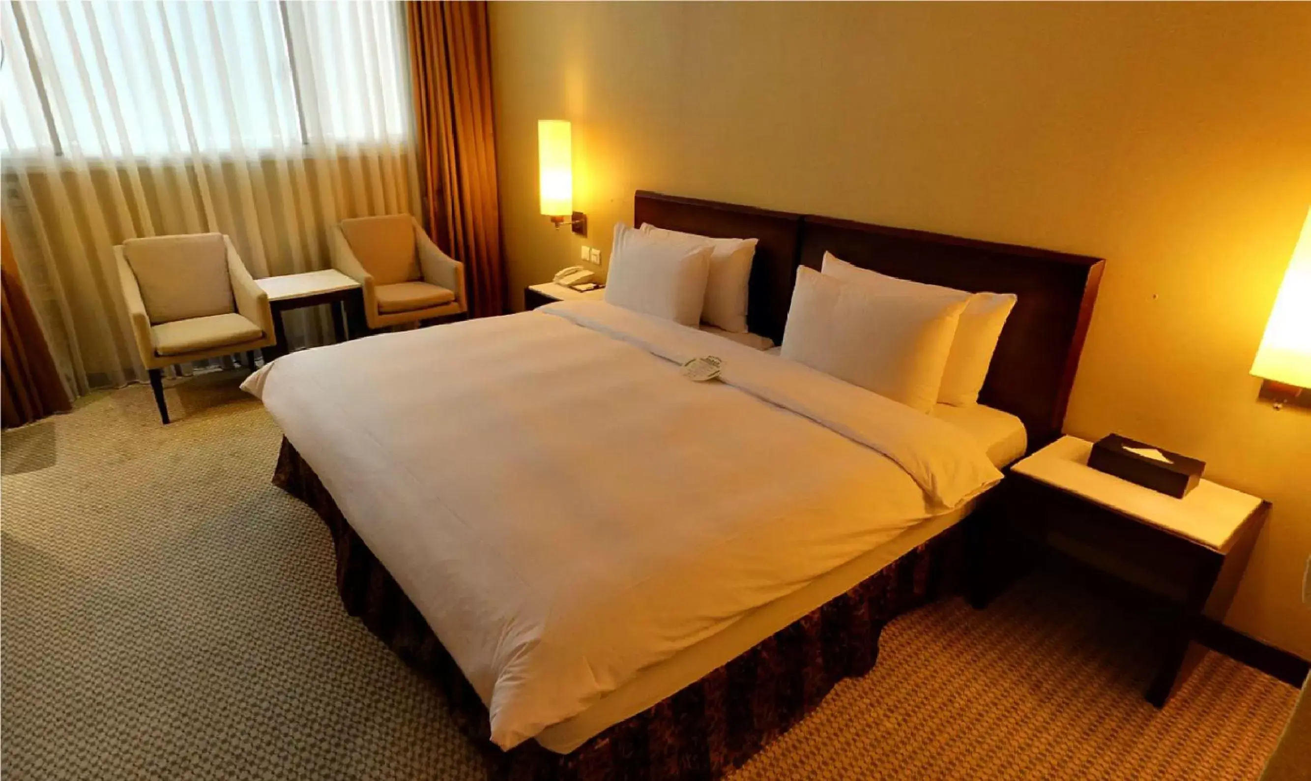 Bed in Taipei International Hotel