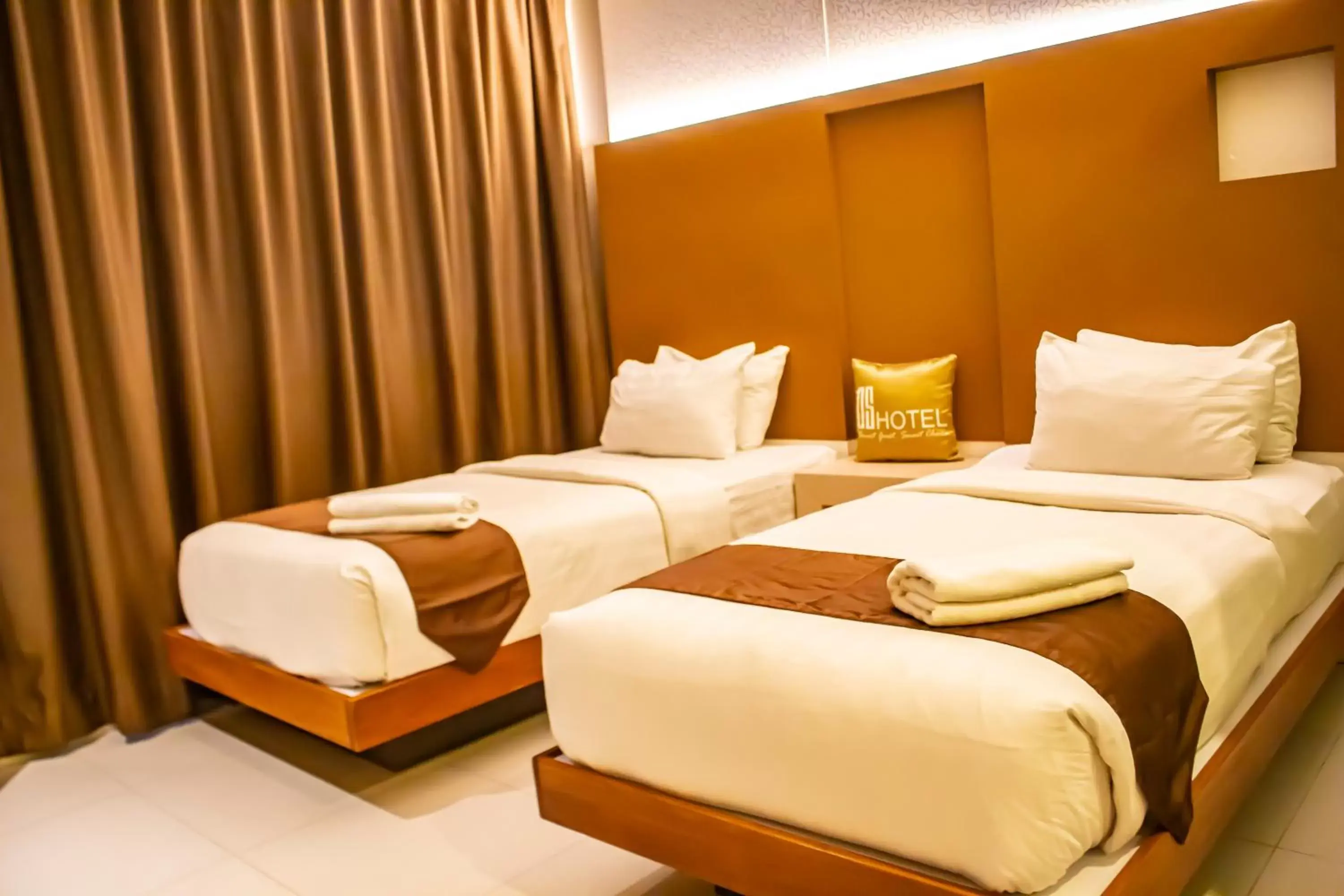 Bed in OS Hotel Airport Batam