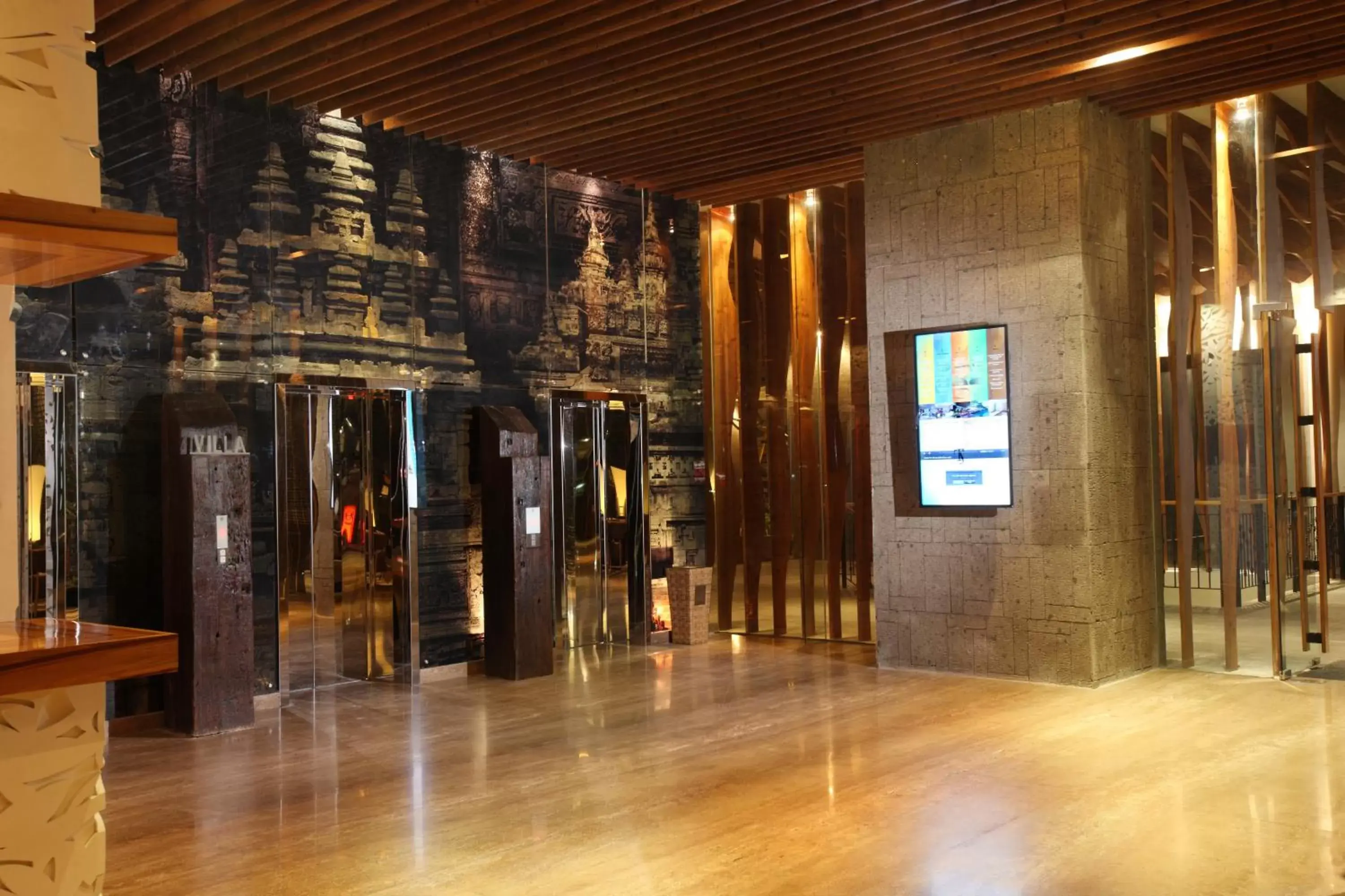 Lobby or reception in TS SUITES Seminyak Bali