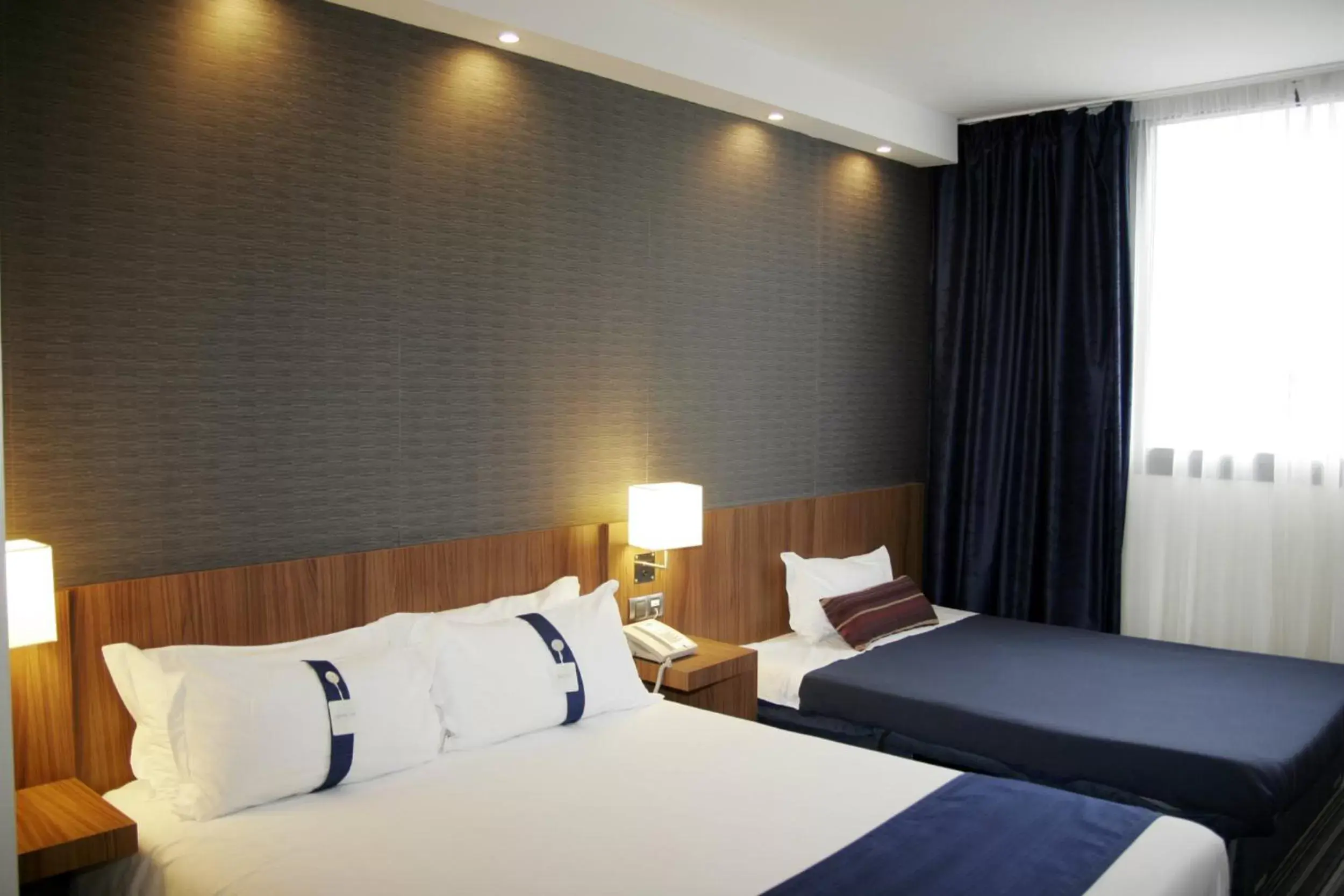 Bed in Holiday Inn Express Bilbao Airport, an IHG Hotel