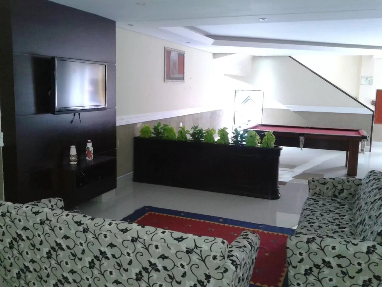 Living room, Bed in Hotel Estação Express