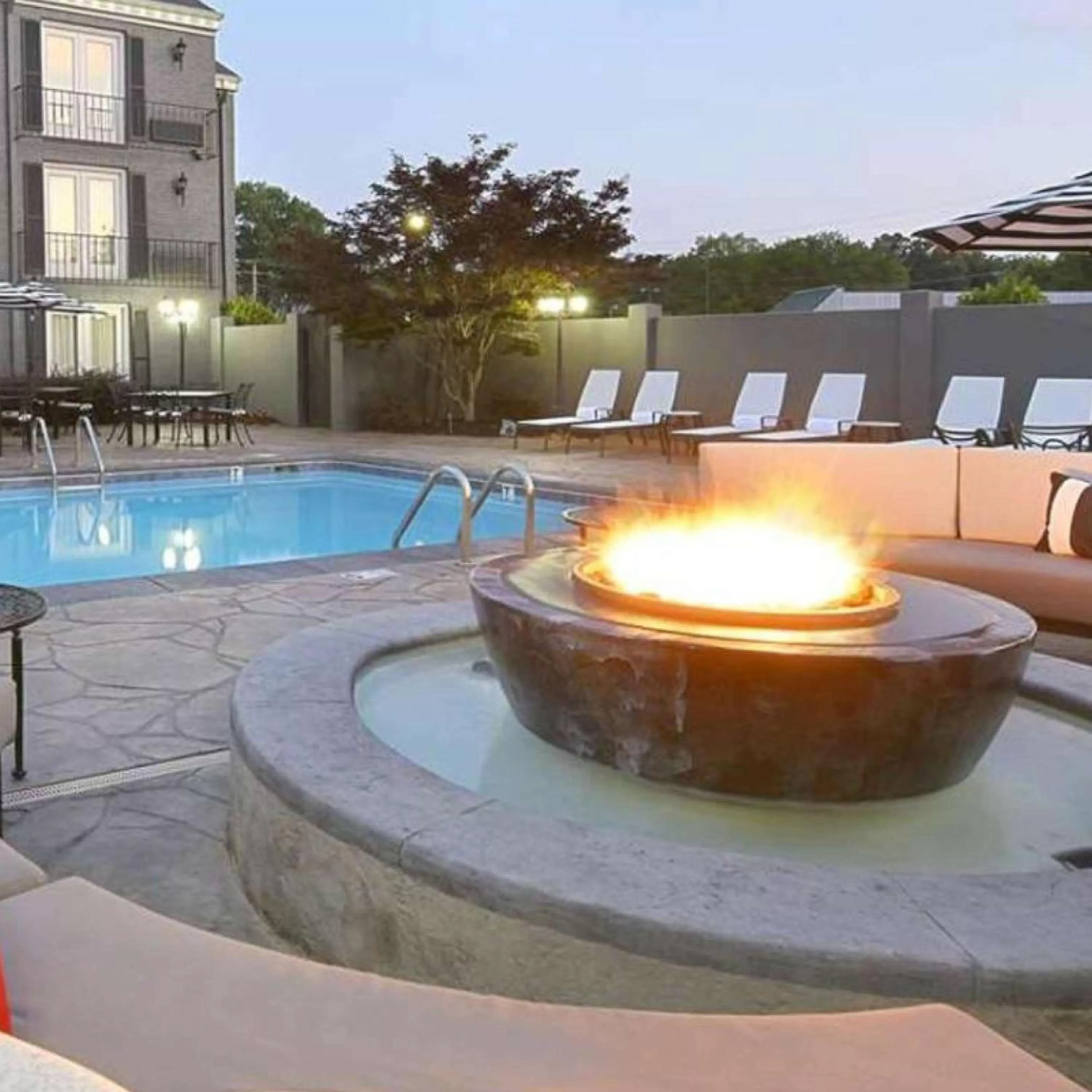 Pool view in The Burgundy Hotel, Tapestry Collection by Hilton