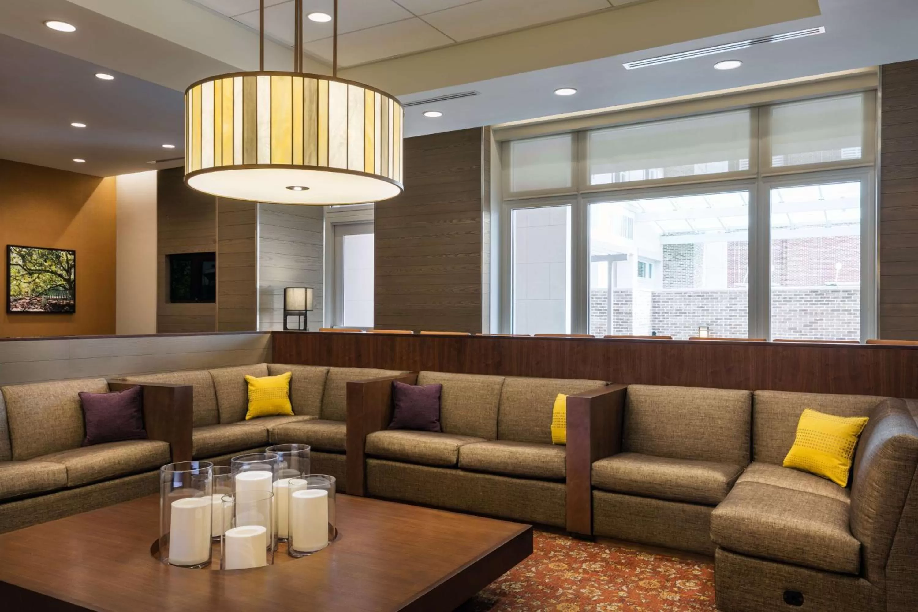 Communal lounge/ TV room in Hyatt House Charleston - Historic District