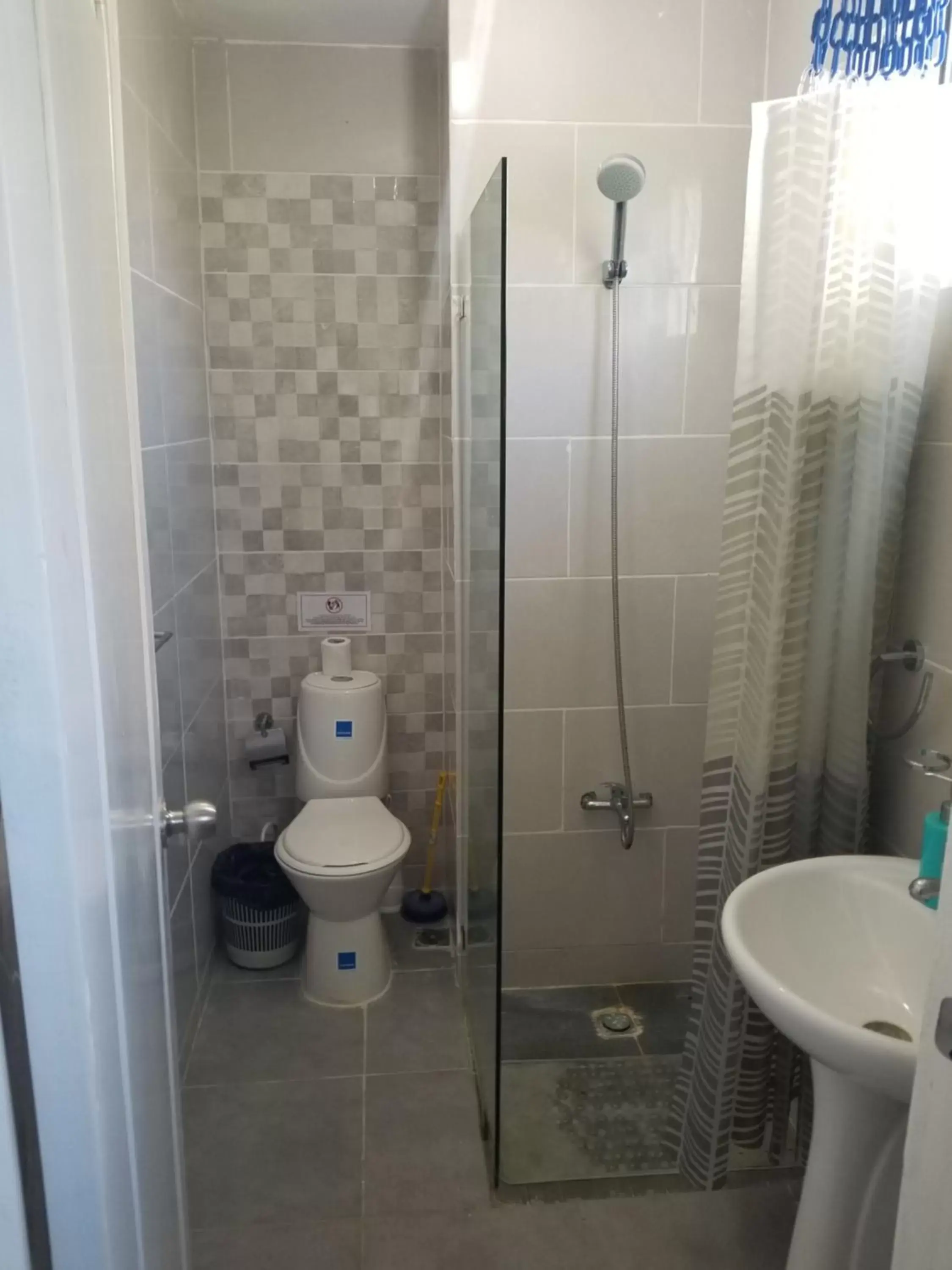 Toilet, Bathroom in Karimar Beach Condo Hotel