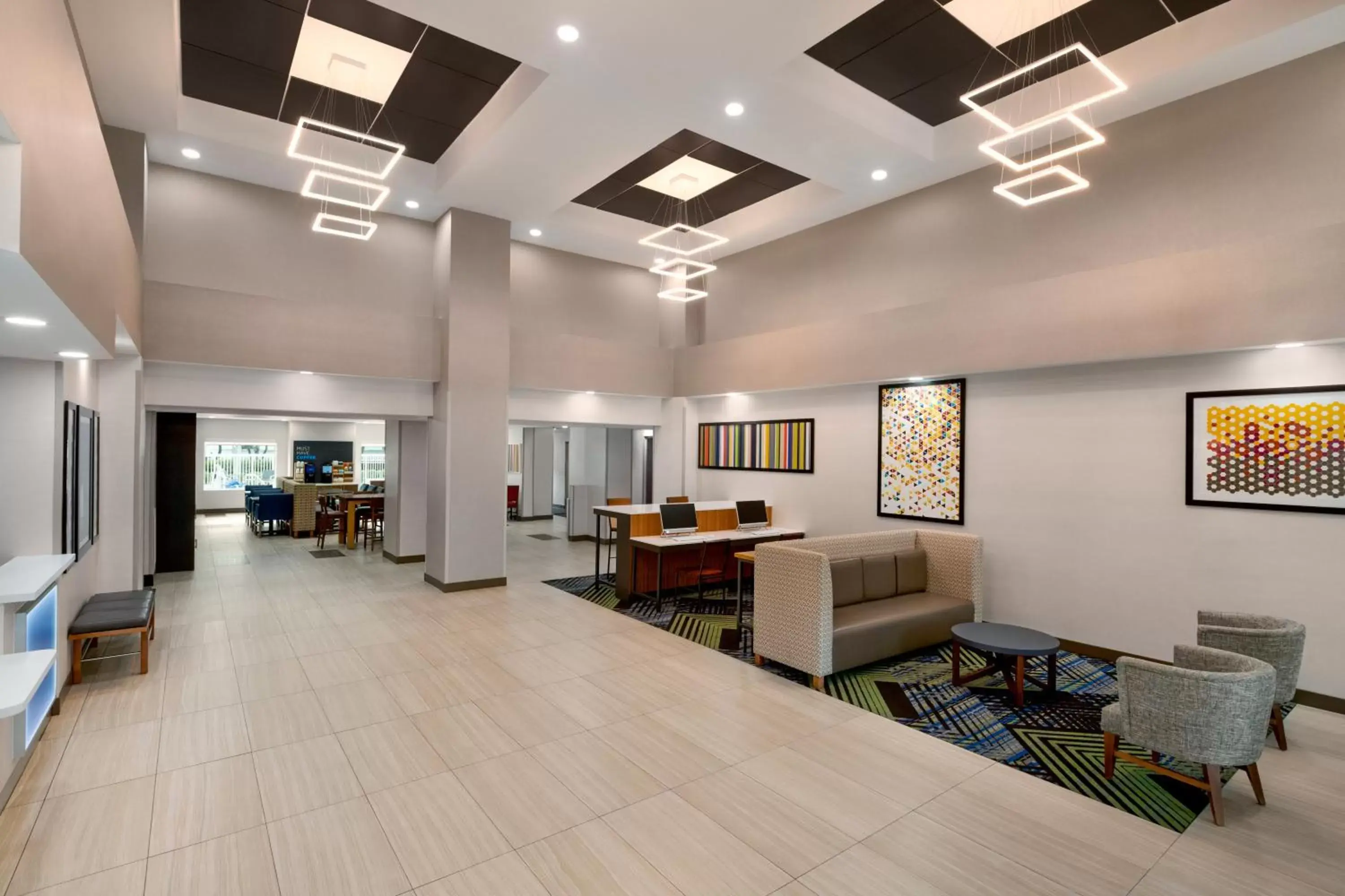 Lobby or reception, Seating Area in Holiday Inn Express & Suites Pembroke Pines-Sheridan St, an IHG Hotel