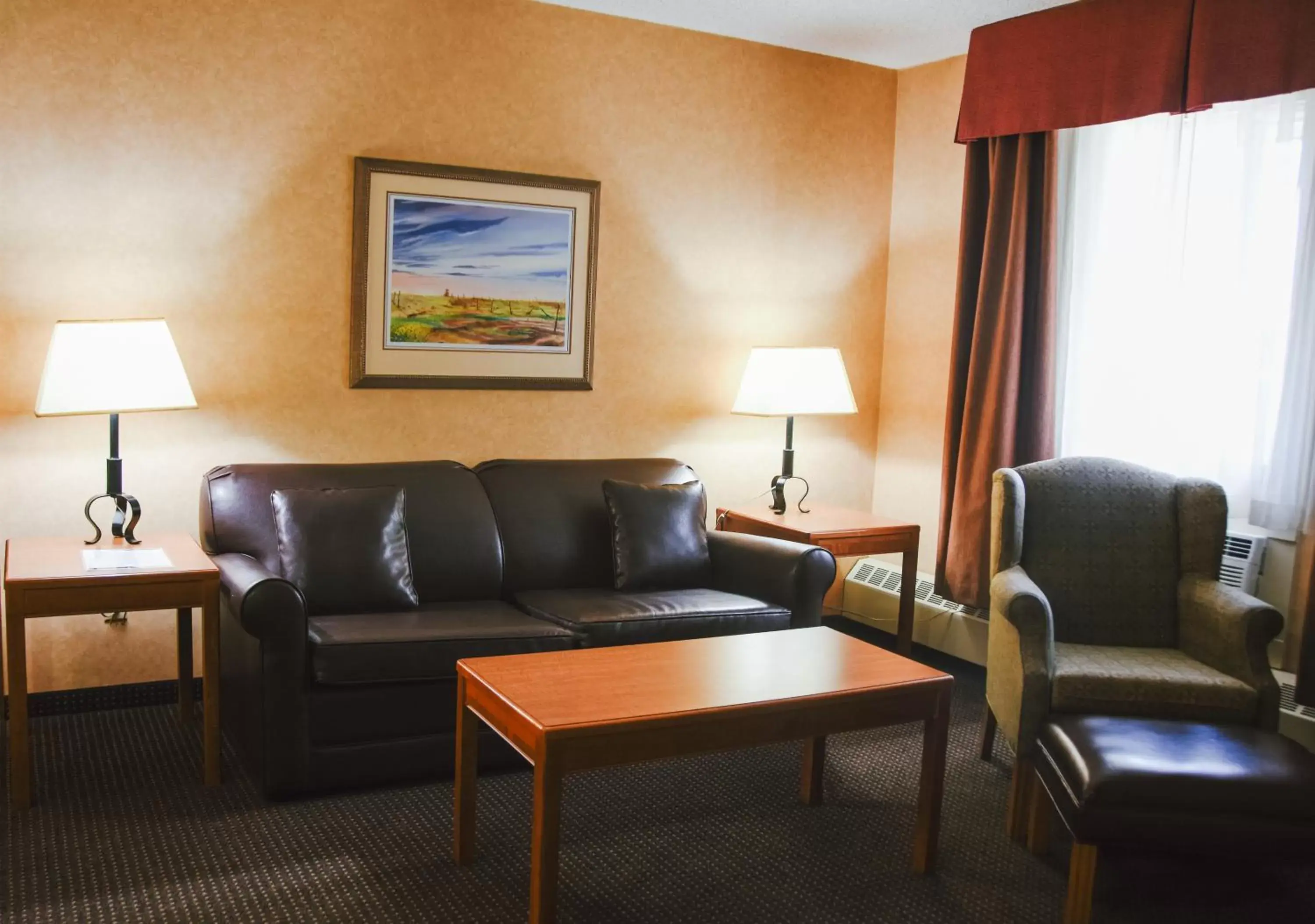 Photo of the whole room, Seating Area in Stony Plain Inn & Suites
