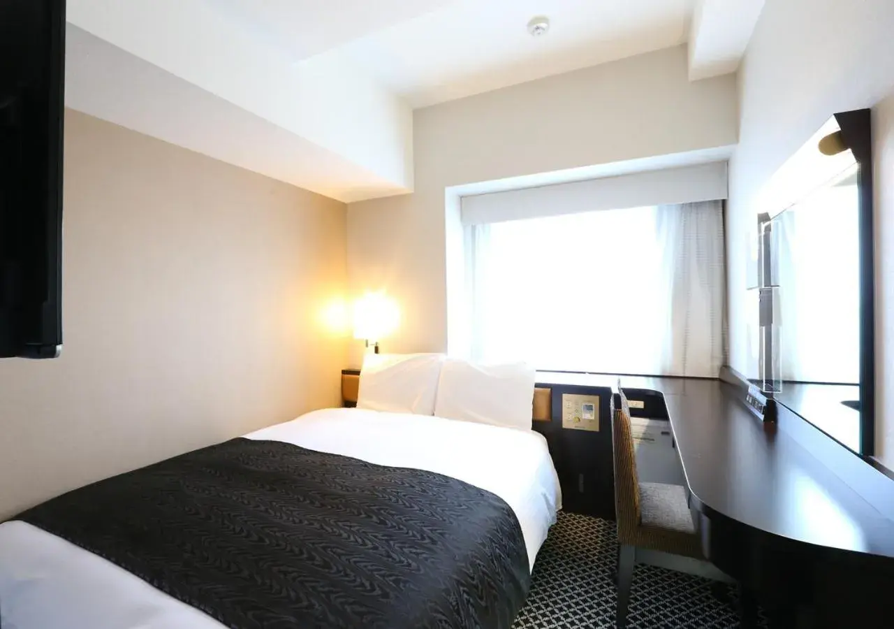 Bed in APA Hotel Shinagawa Sengakuji Eki-Mae