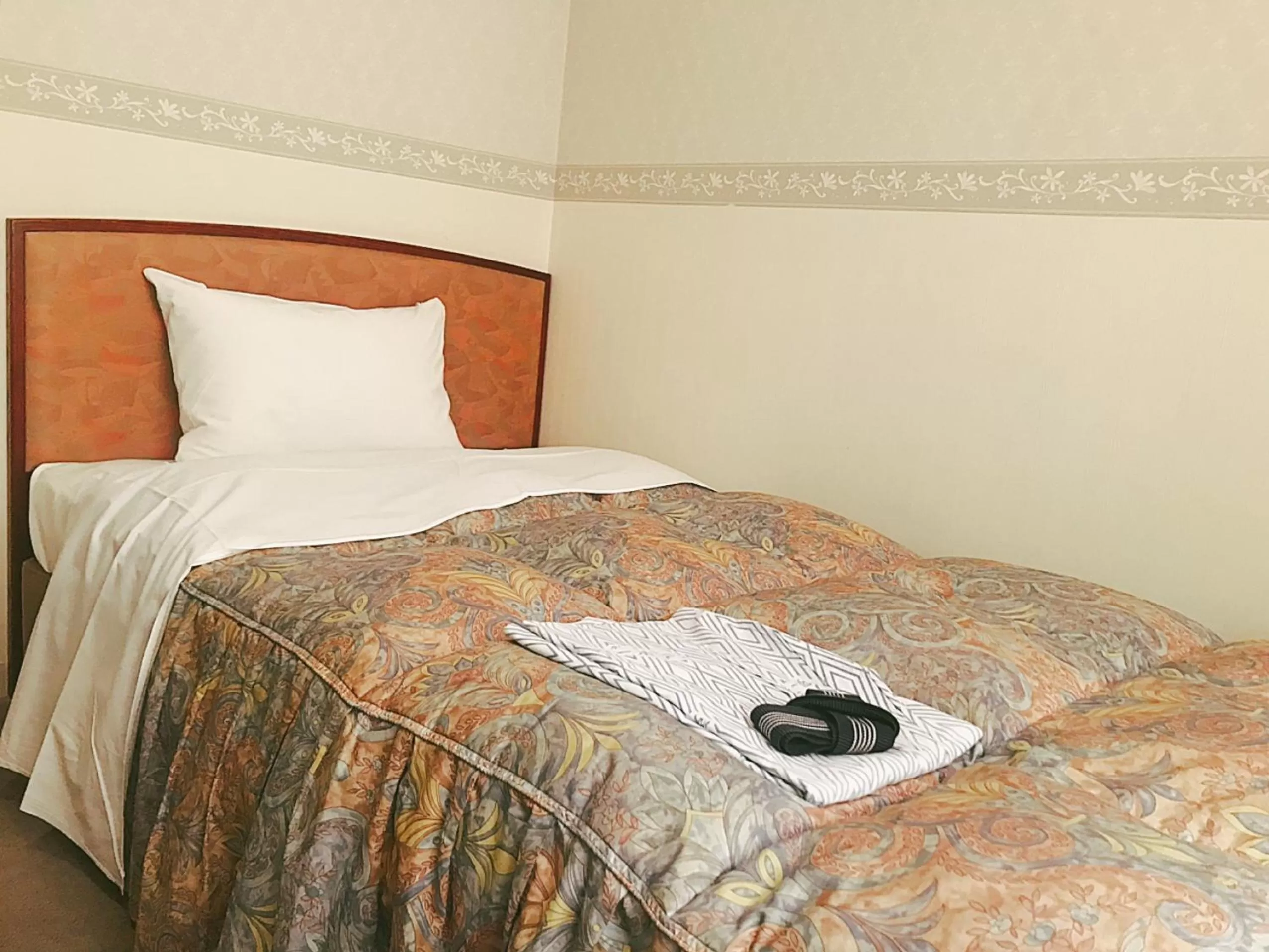 Bed in Kagoshima Daiichi Hotel Kishaba