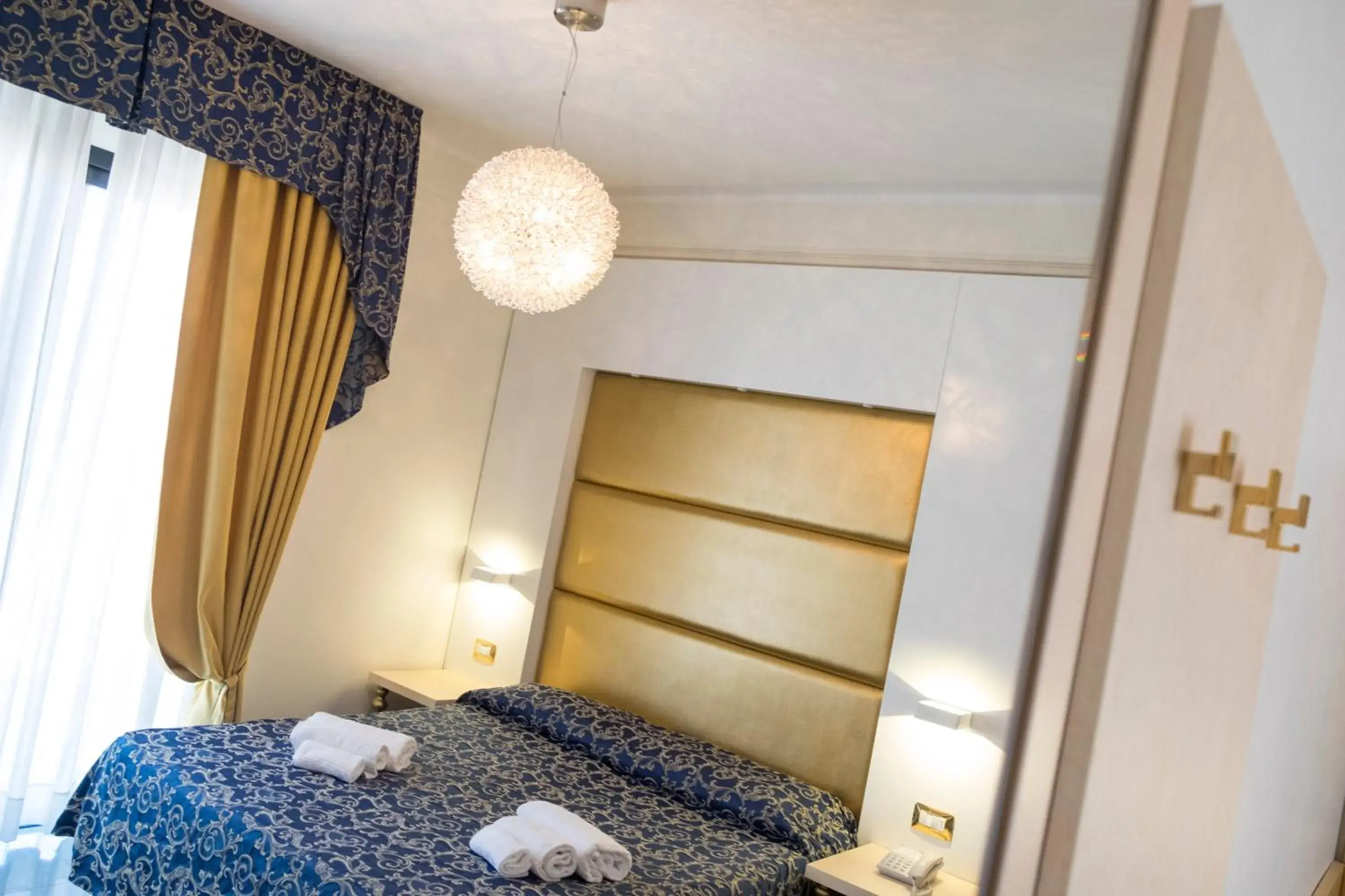 Bed, Room Photo in Hotel Ambassador