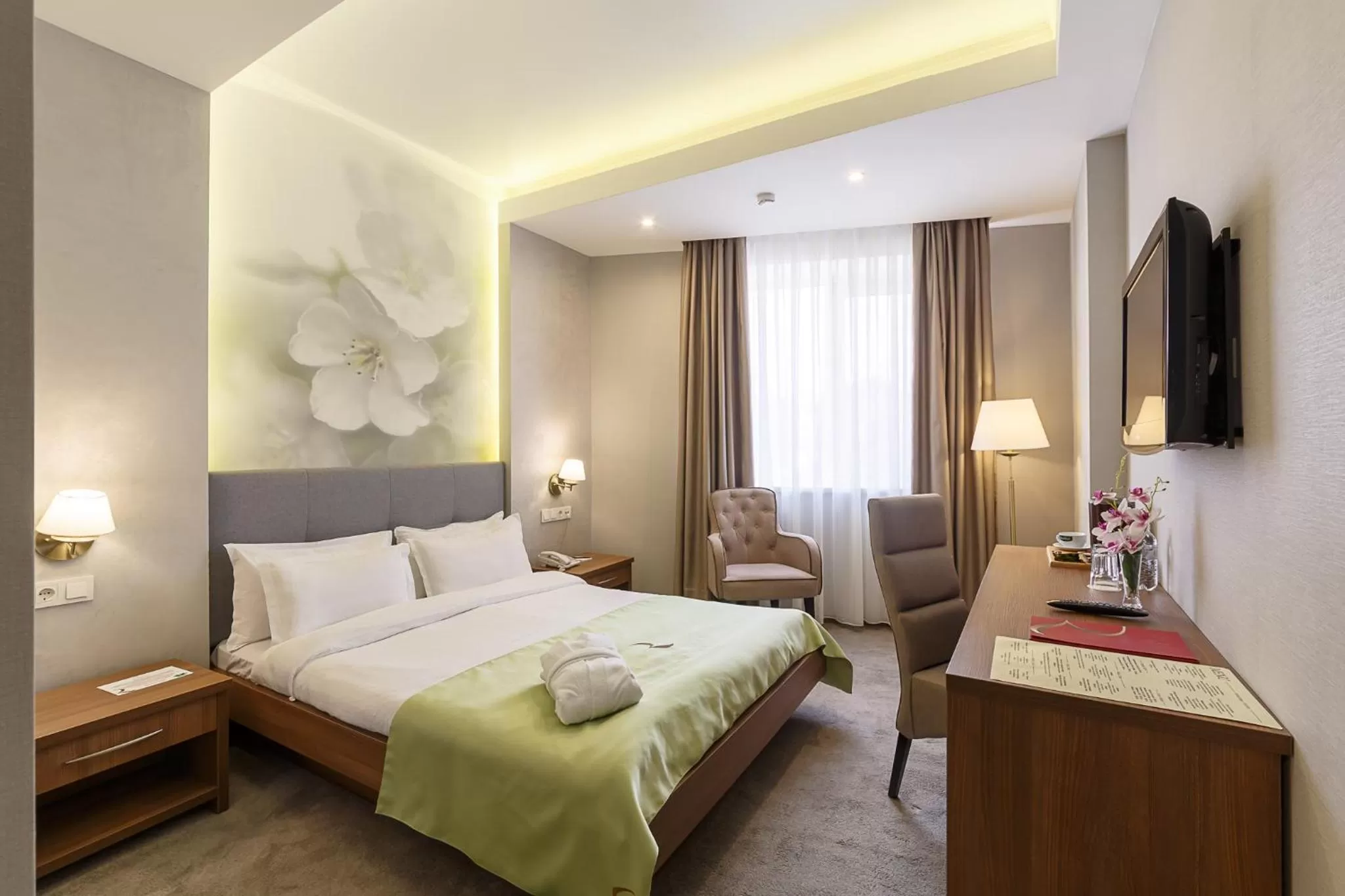 Seating area, Bed in Renion Hills Hotel