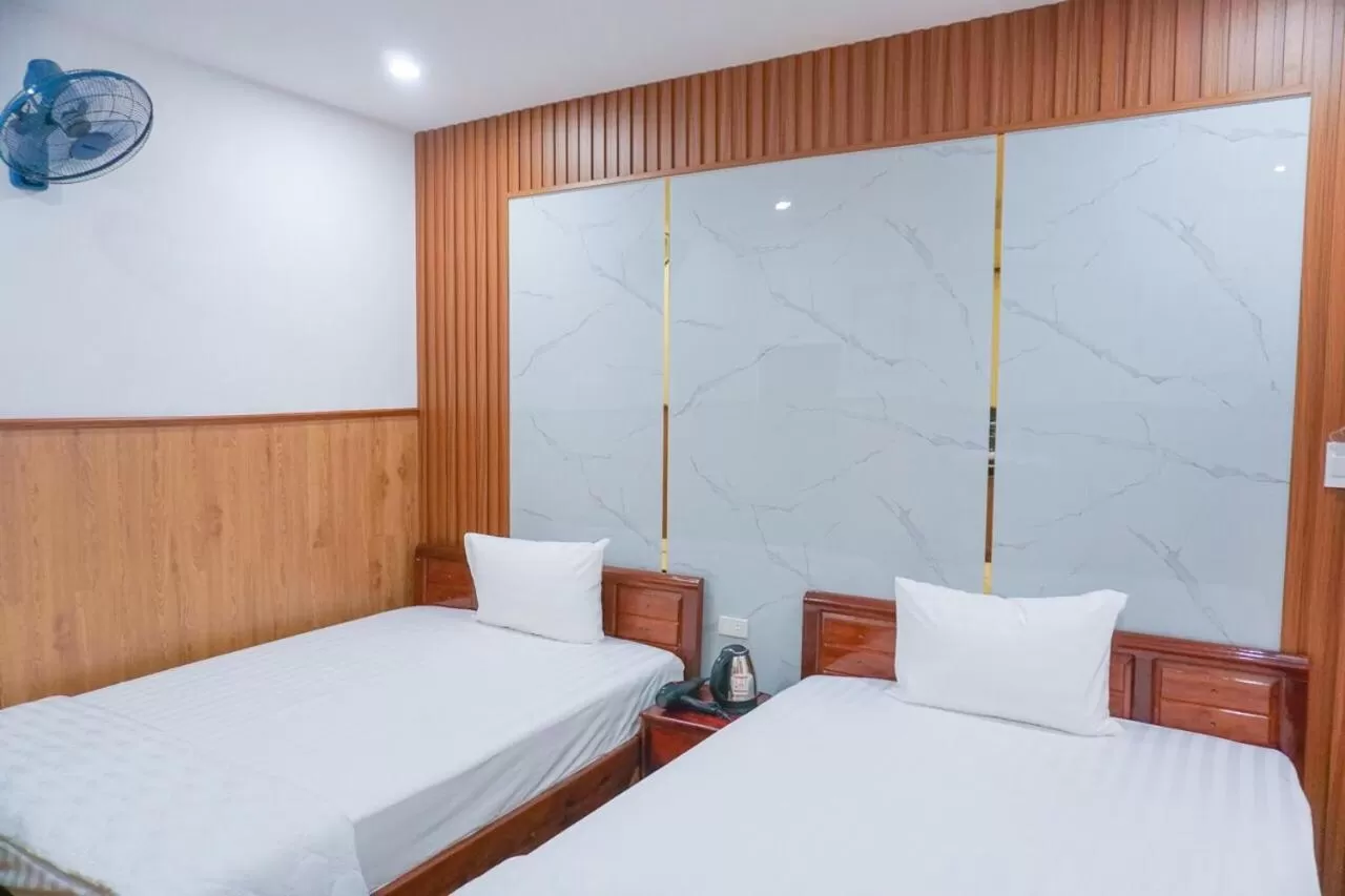 Bed in Nhu Y Hotel