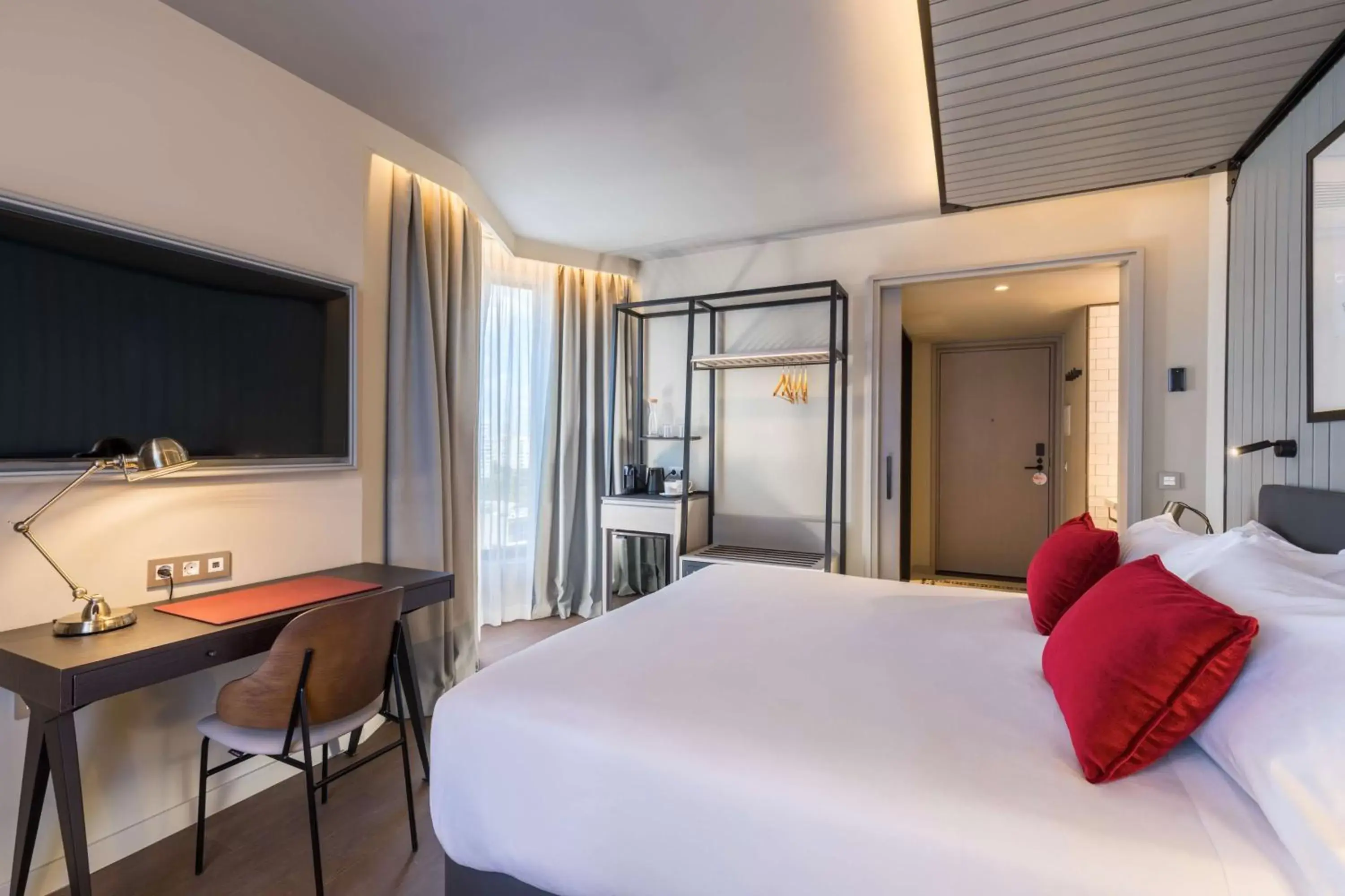 Bedroom, TV/Entertainment Center in Canopy by Hilton Madrid Castellana