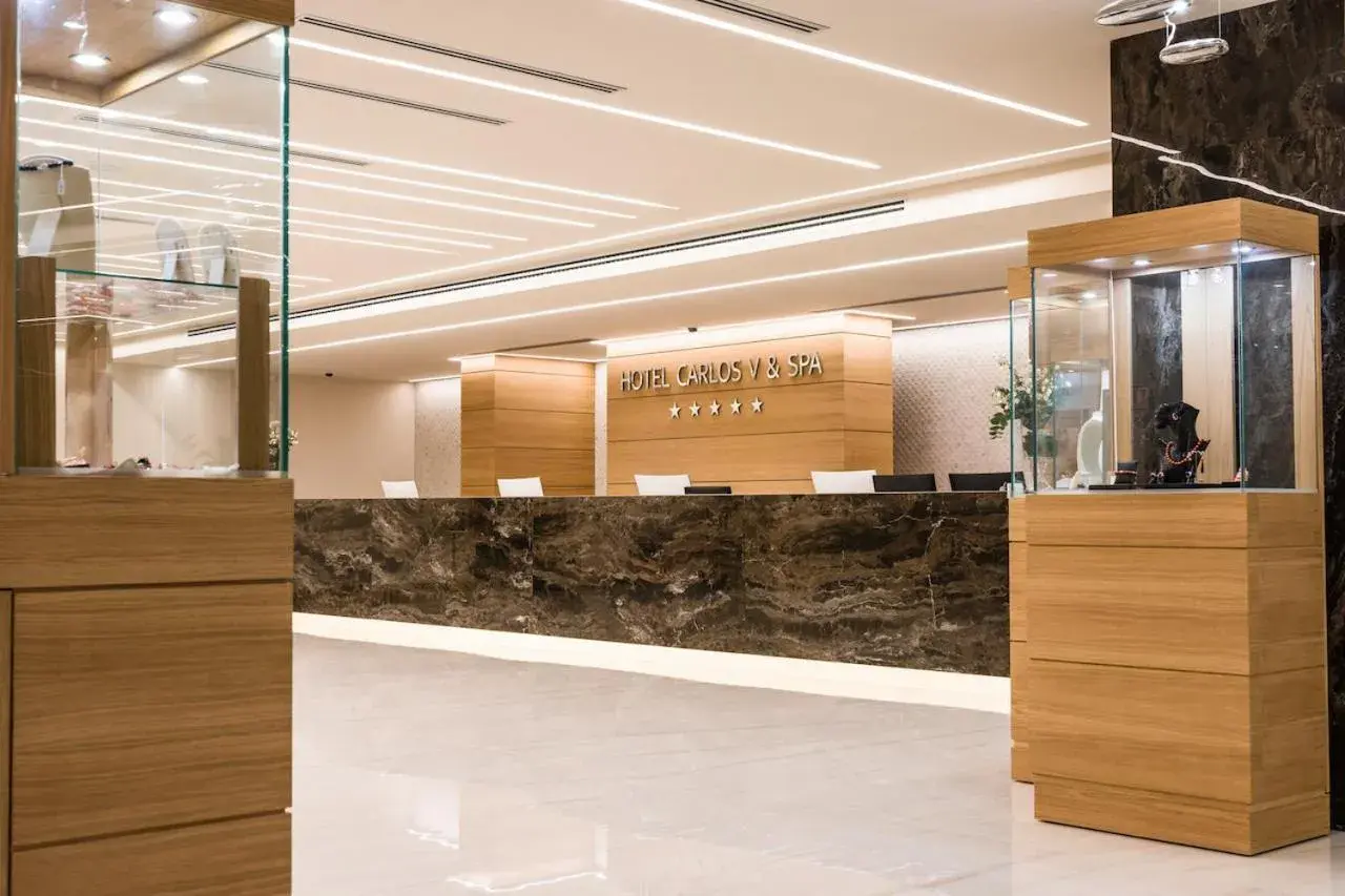 Lobby or reception in Smy Carlos V Wellness & Spa Alghero Lobby or reception in Smy Carlos V Wellness & Spa Alghero