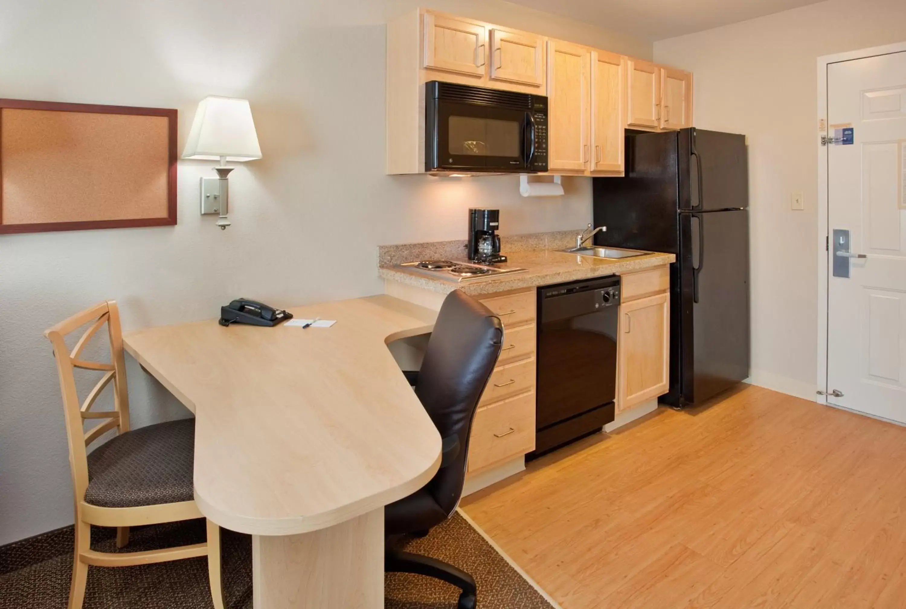Photo of the whole room, Kitchen/Kitchenette in Candlewood Suites Junction City - Ft. Riley, an IHG Hotel