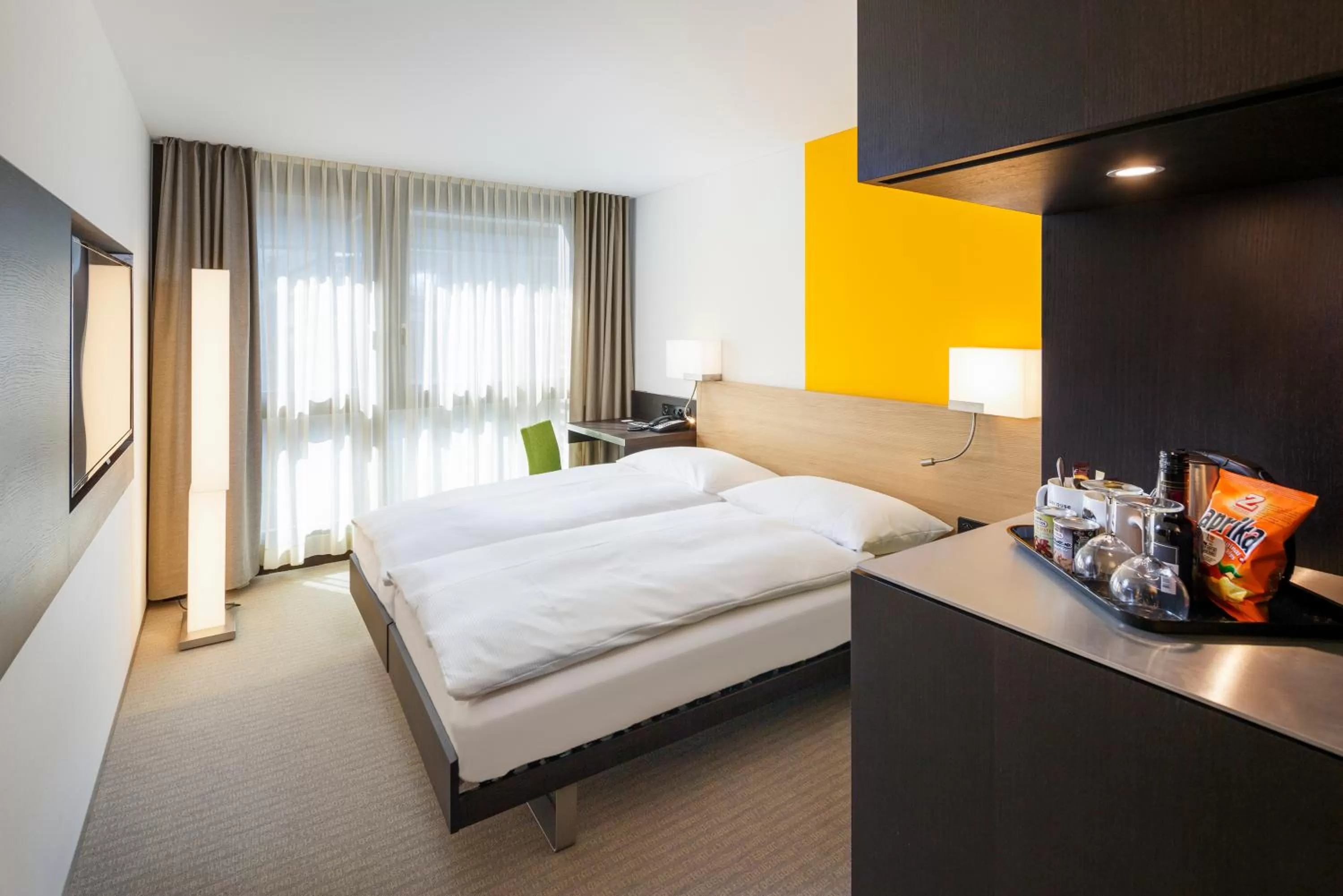 Photo of the whole room, Bed in Züri by Fassbind