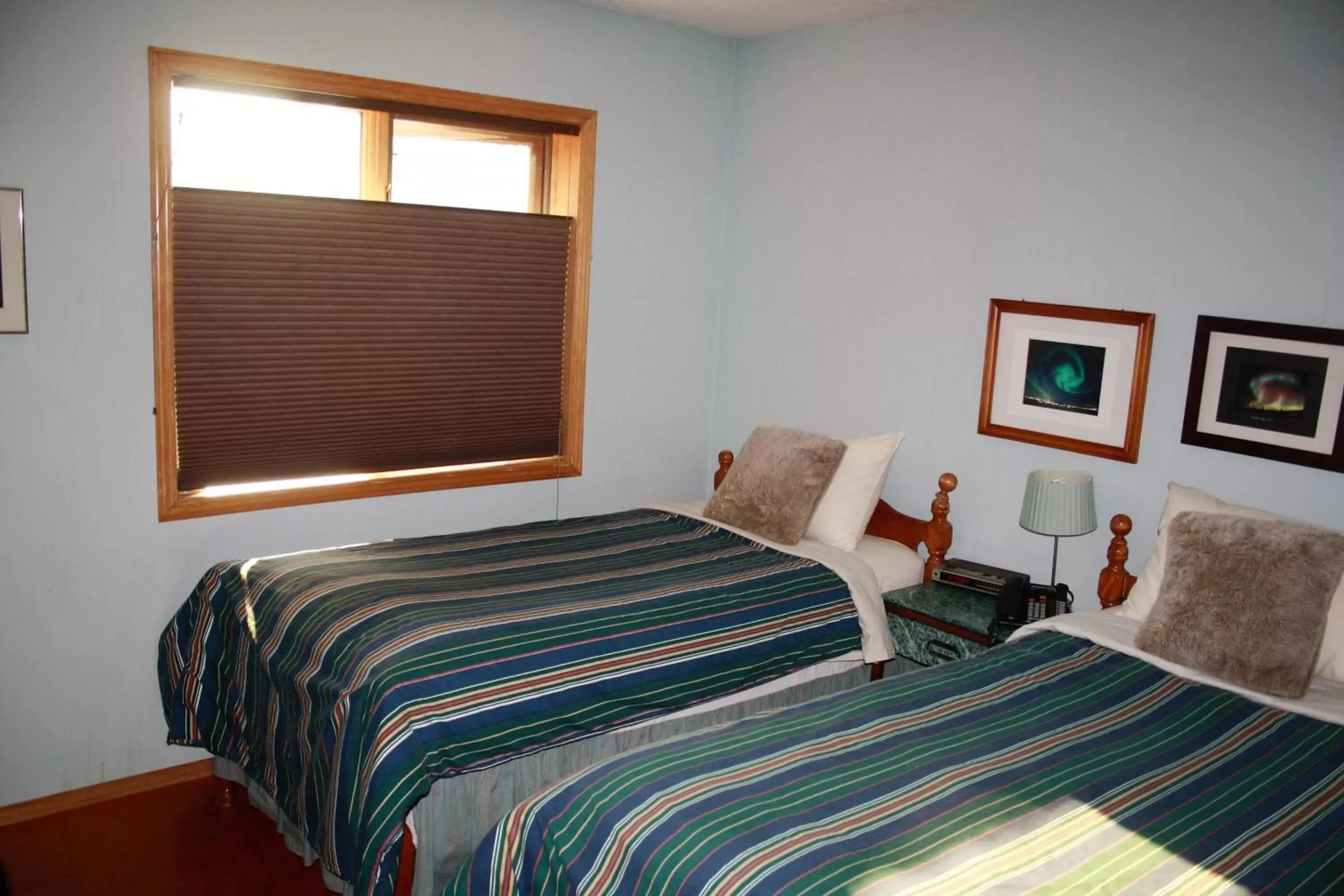 Bed in Aurora Bayside Inn
