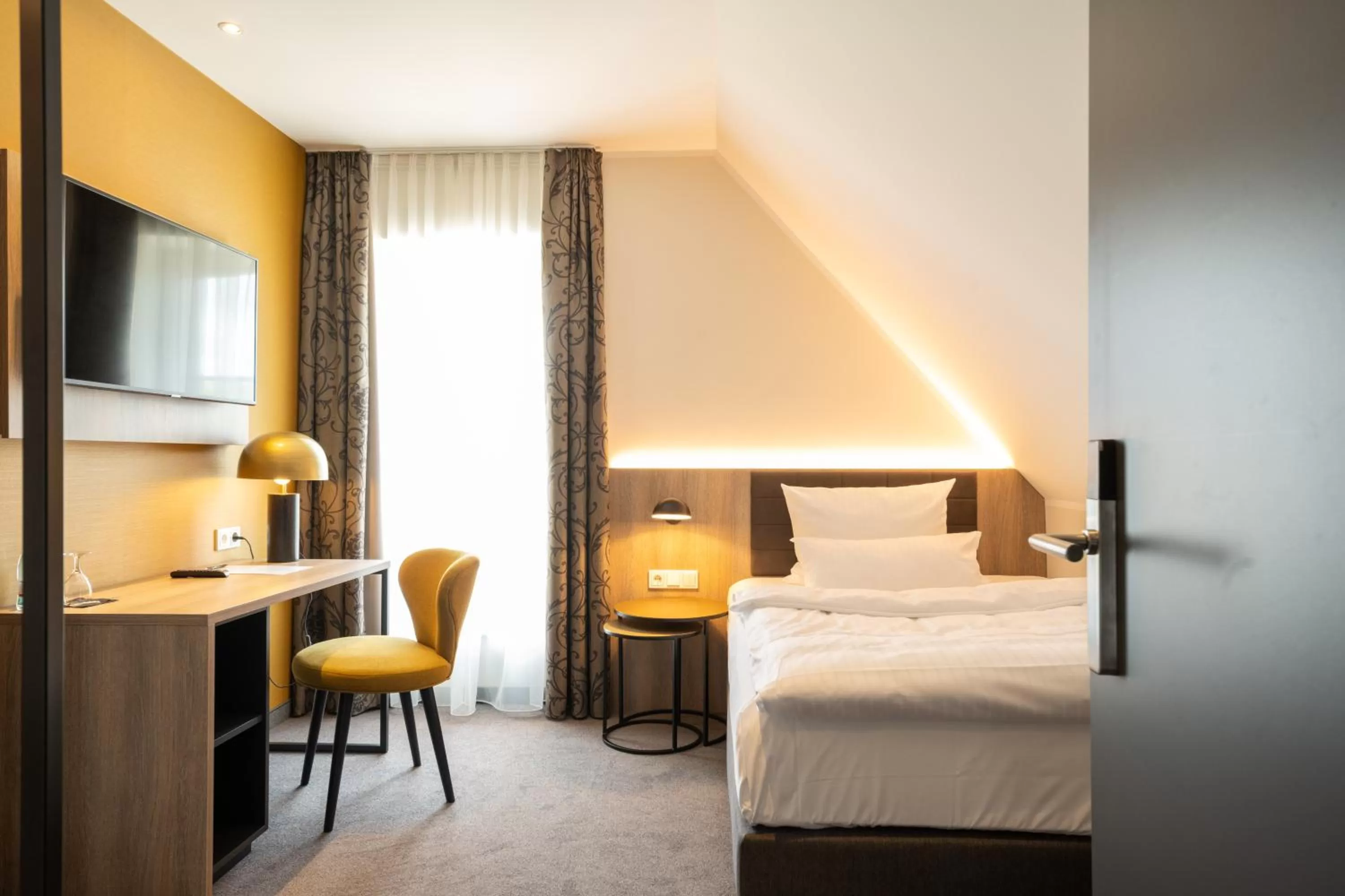 Bed in Hotel Rheinischer Hof