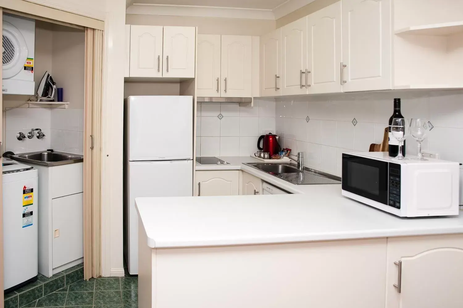 Kitchen/Kitchenette in Pegasus Motor Inn and Serviced Apartments