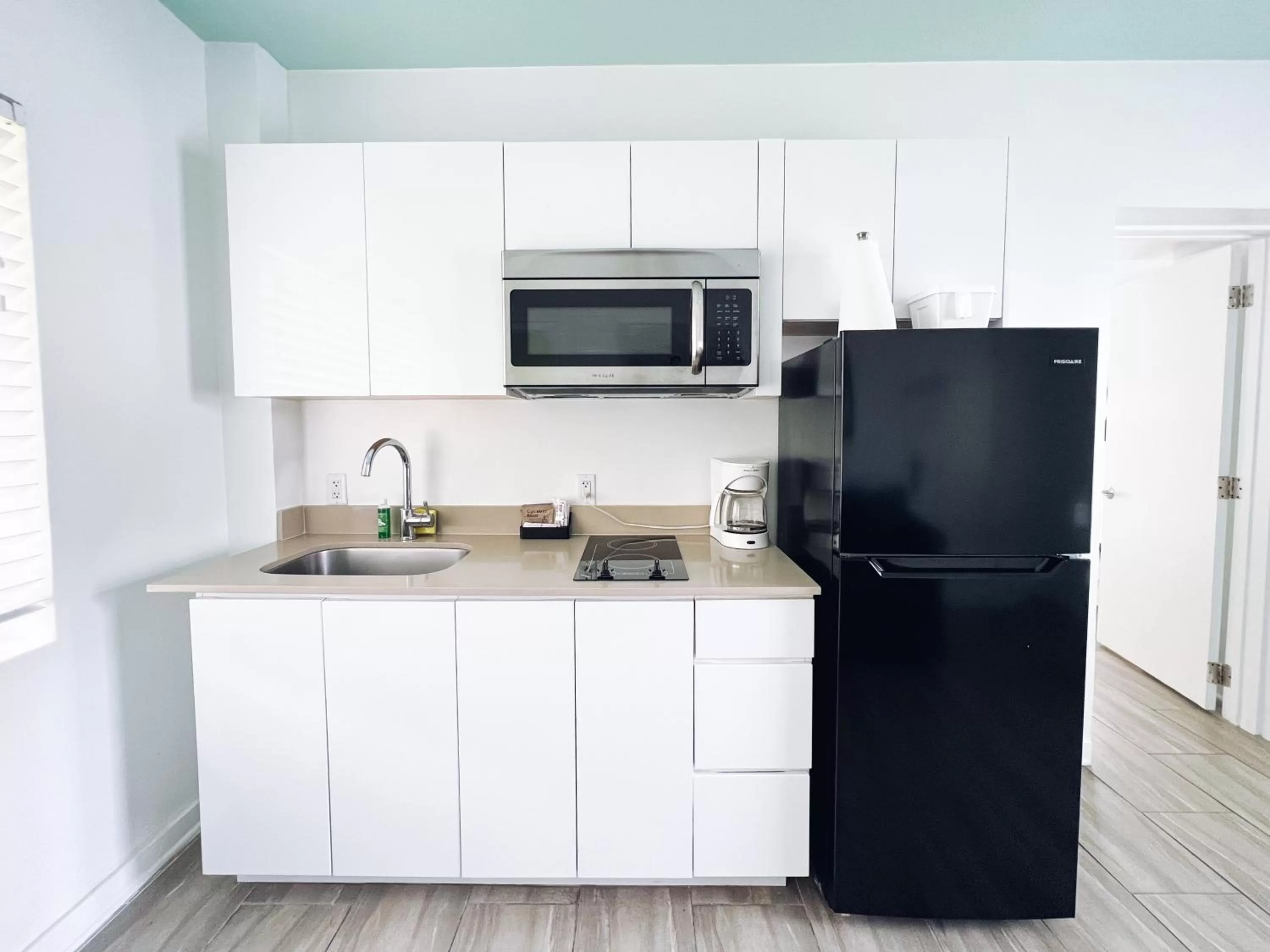 Kitchen or kitchenette in Aqua Hotel