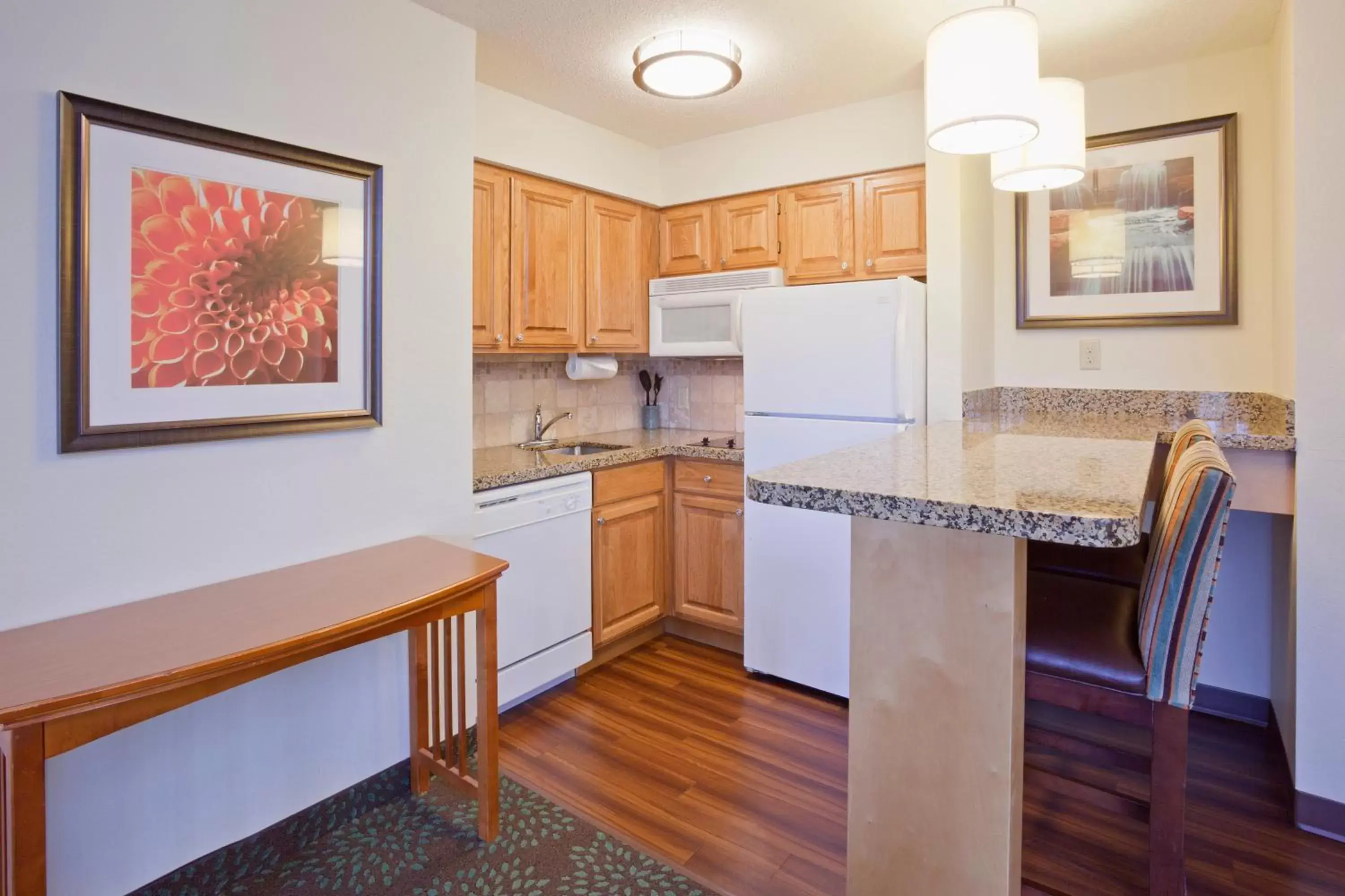 Photo of the whole room, Kitchen/Kitchenette in Staybridge Suites Minneapolis-Maple Grove, an IHG Hotel