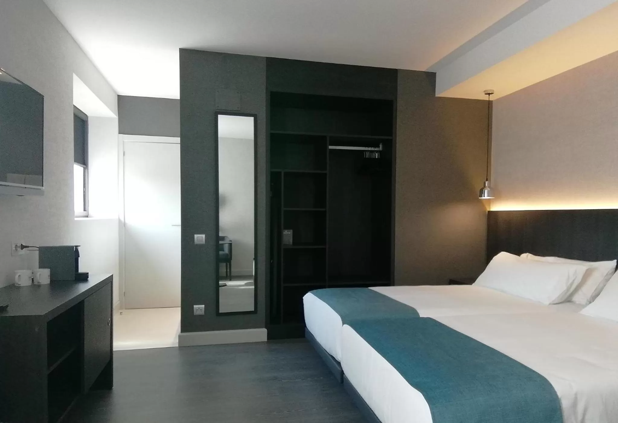 Bed in HG City Suites Barcelona