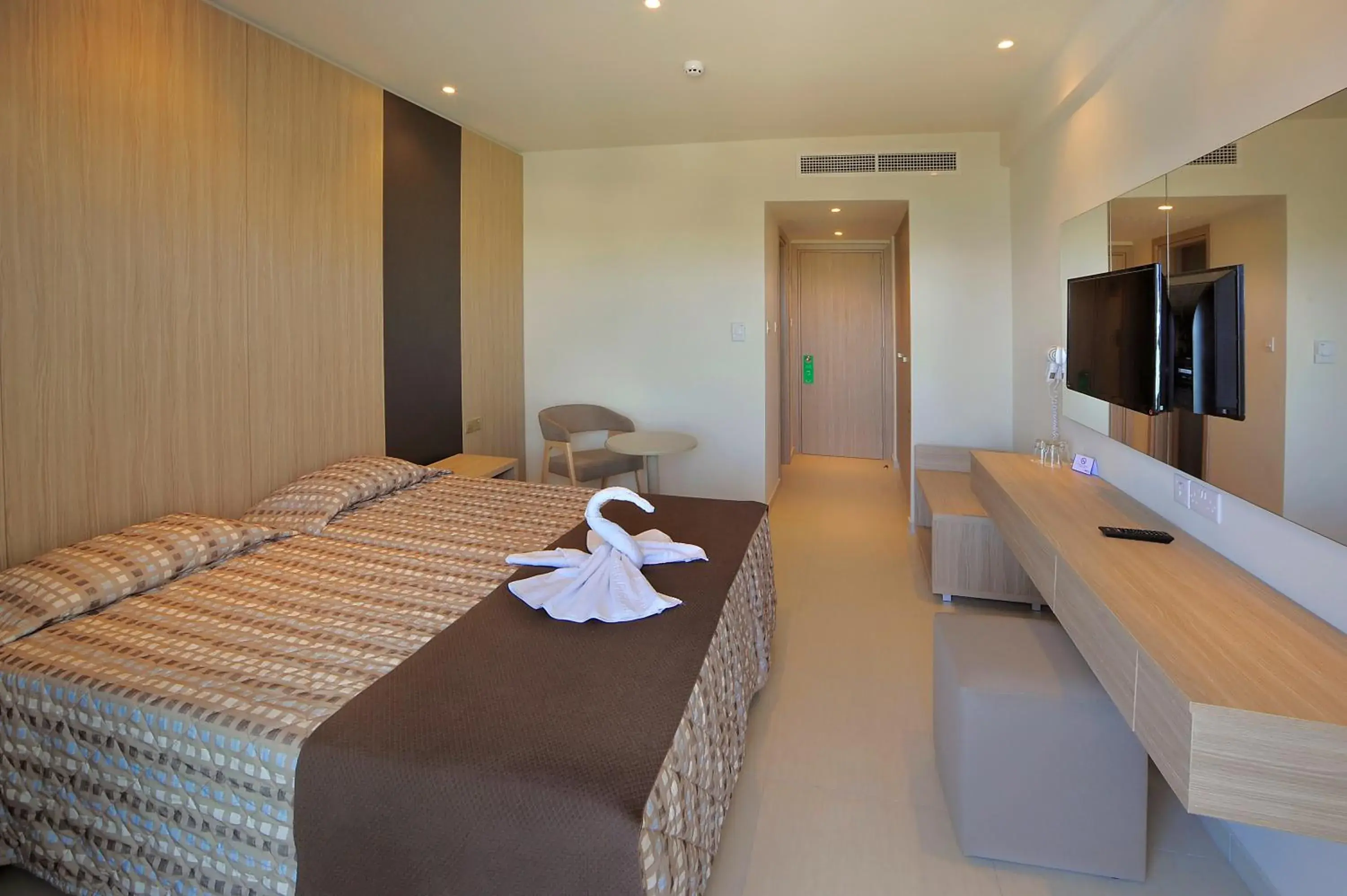 Bed in Nelia Beach Hotel & Spa