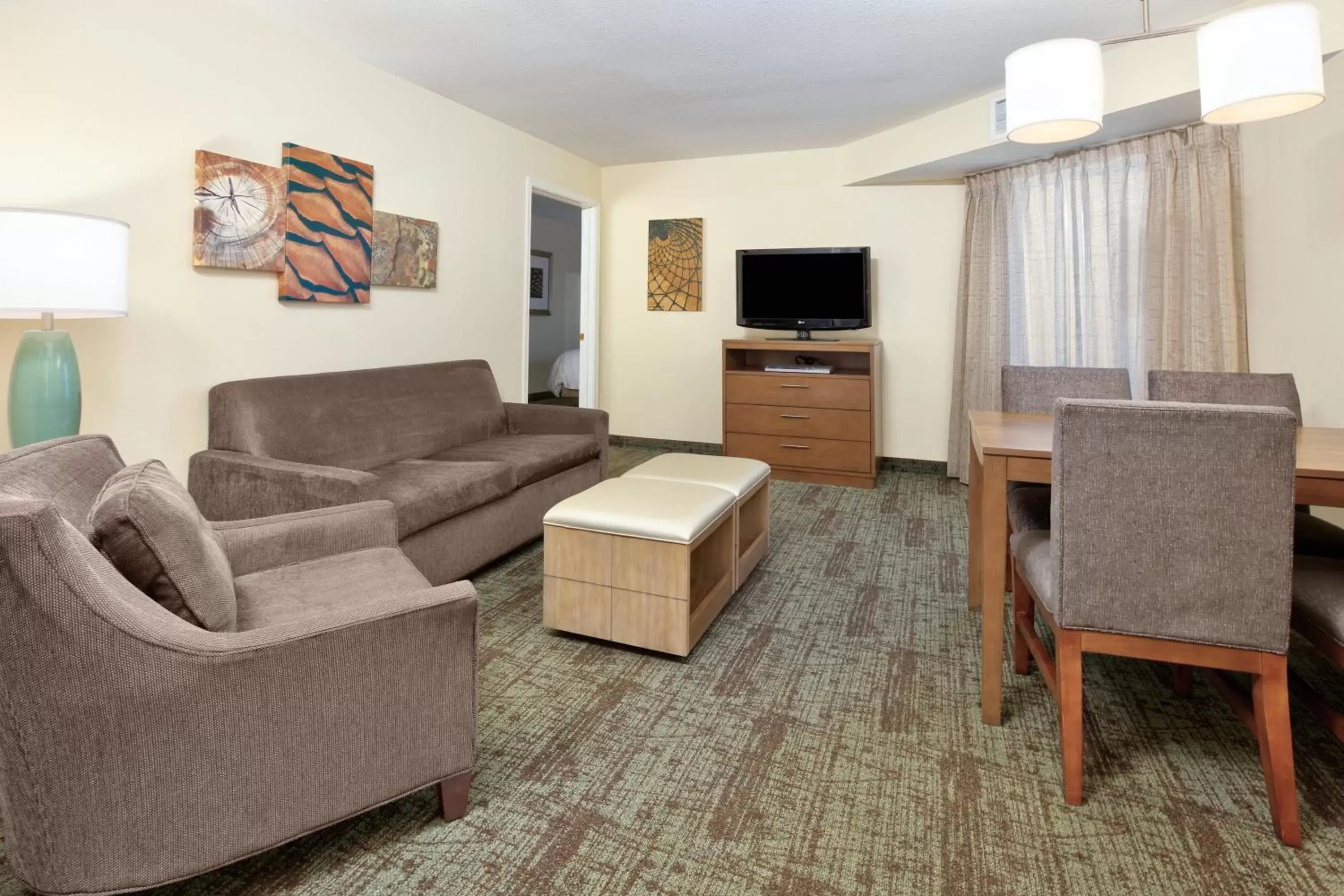 Bedroom, Seating Area in Staybridge Suites Corning, an IHG Hotel