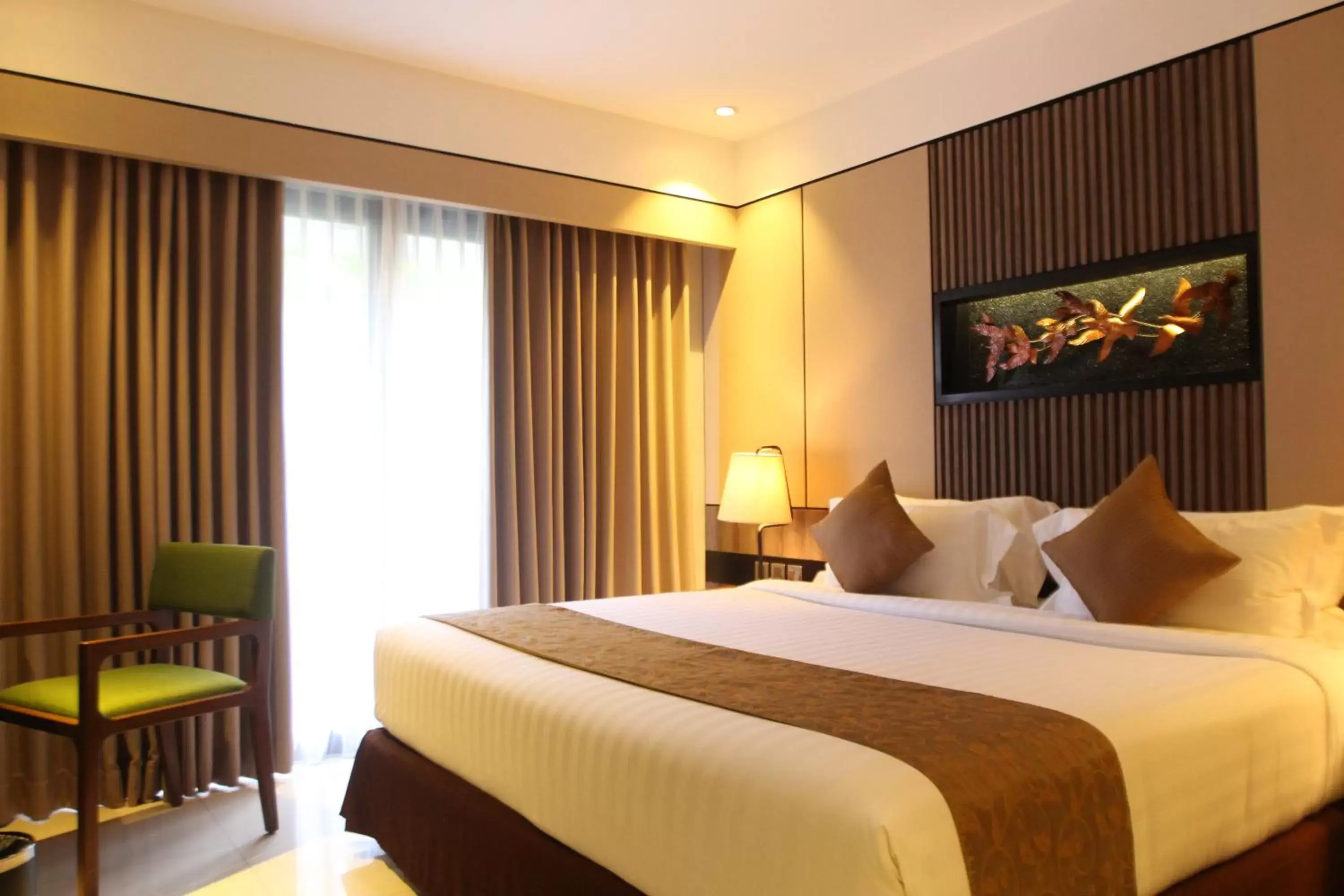 Bed in The Nest Hotel Nusa Dua