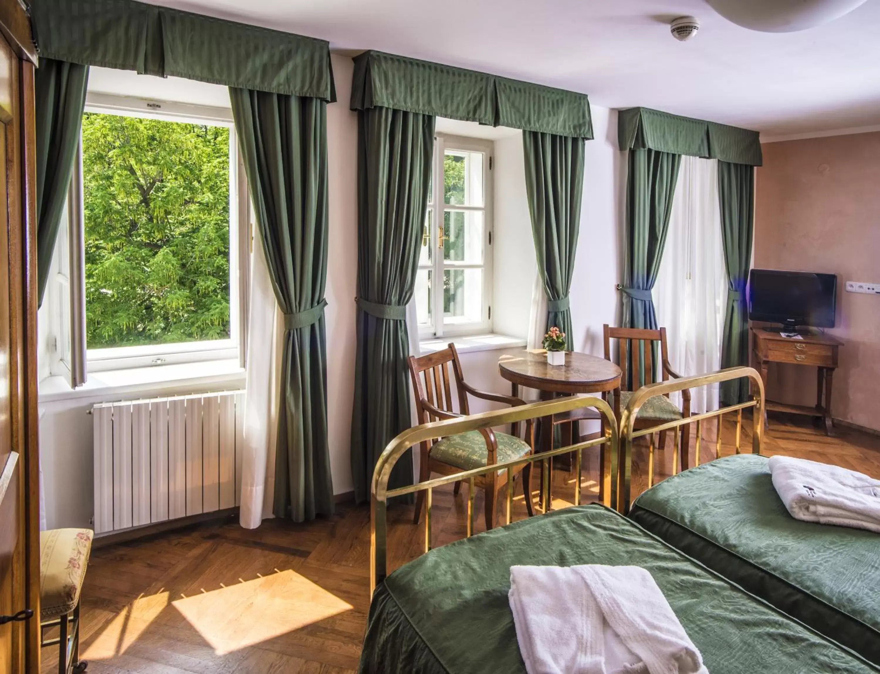 Photo of the whole room, TV/Entertainment Center in Hotel Roma Prague