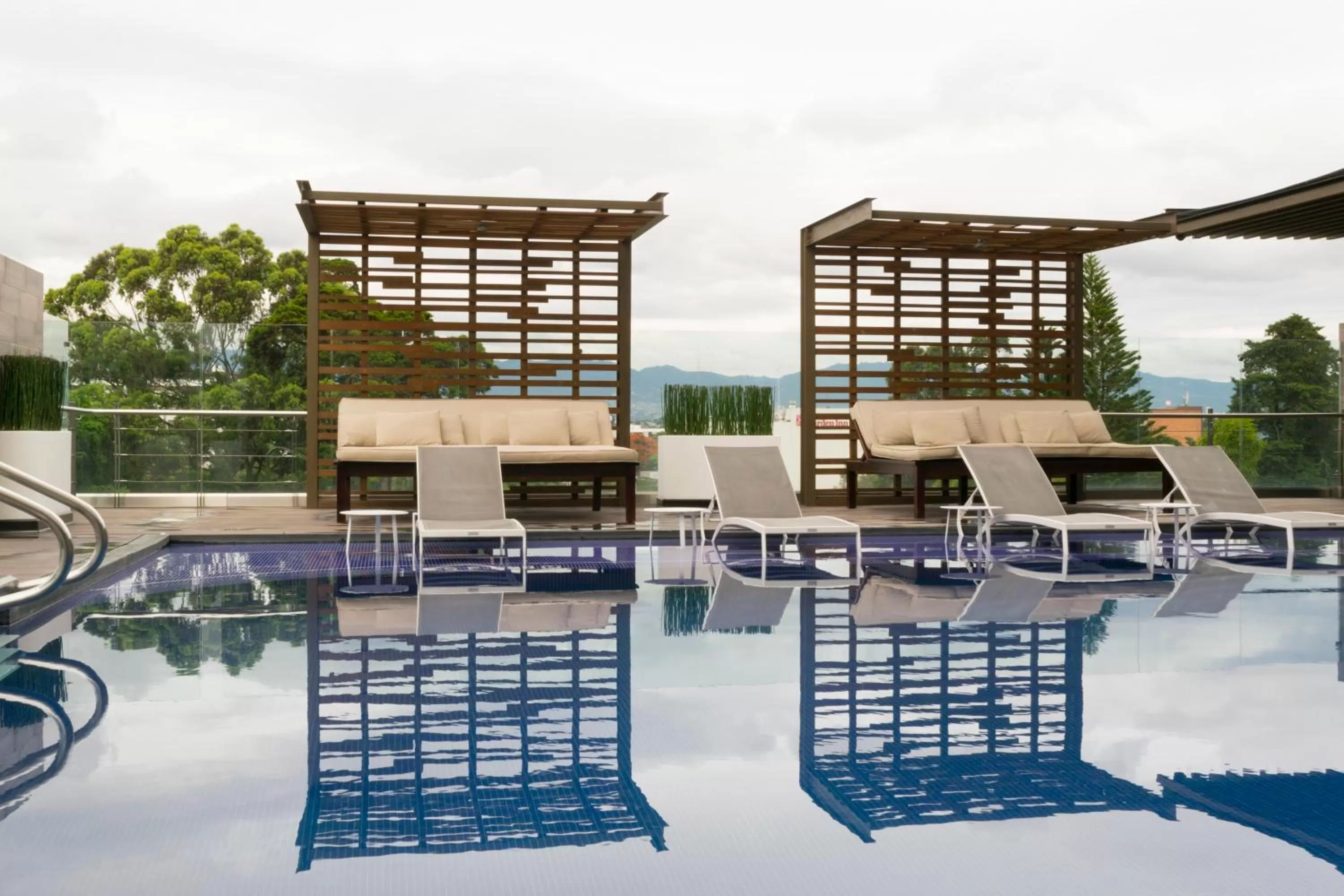 Swimming pool in Holiday Inn Guatemala by IHG