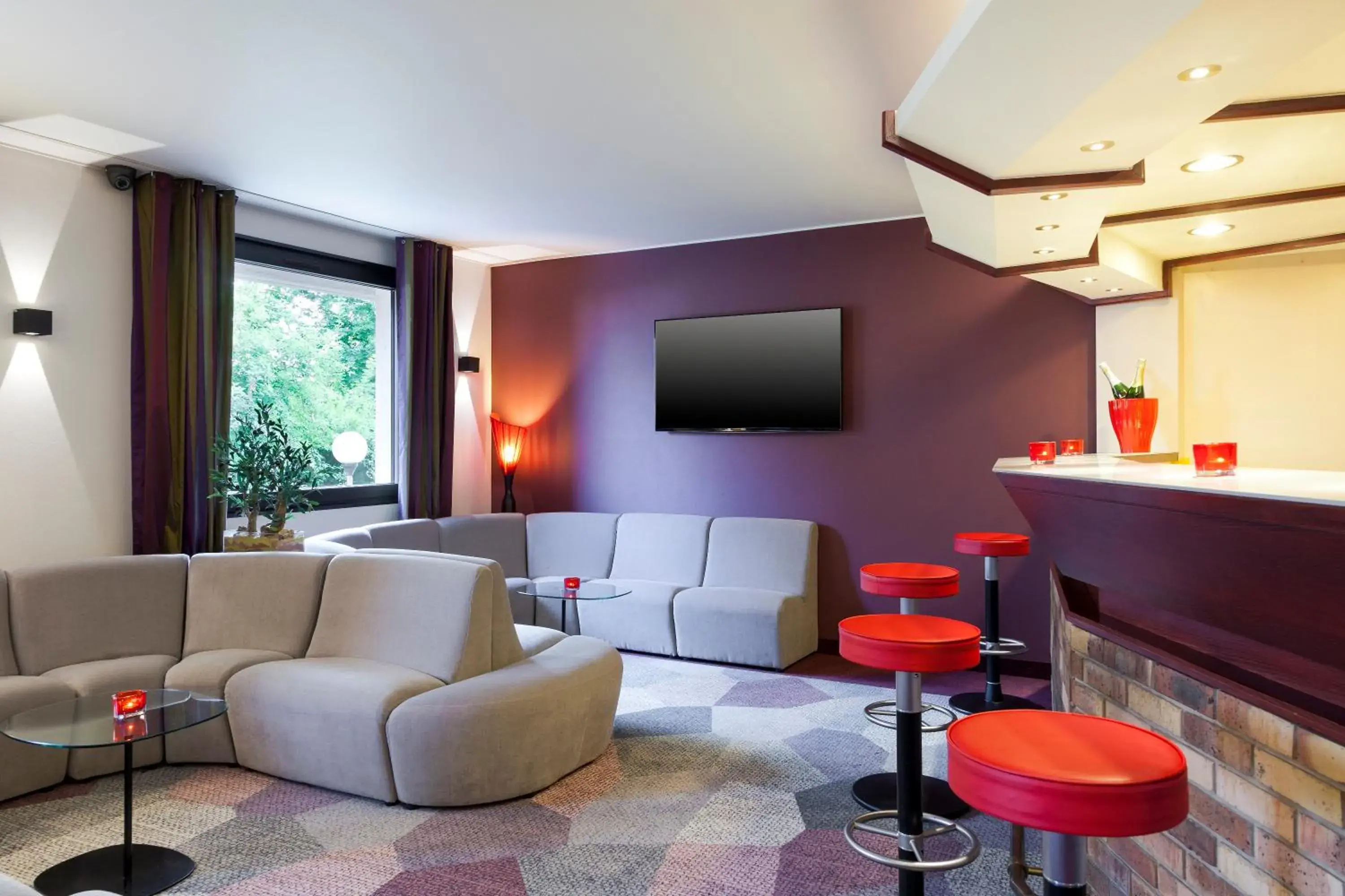 Communal lounge/ TV room, Lounge/Bar in Kyriad Hotel Strasbourg Lingolsheim