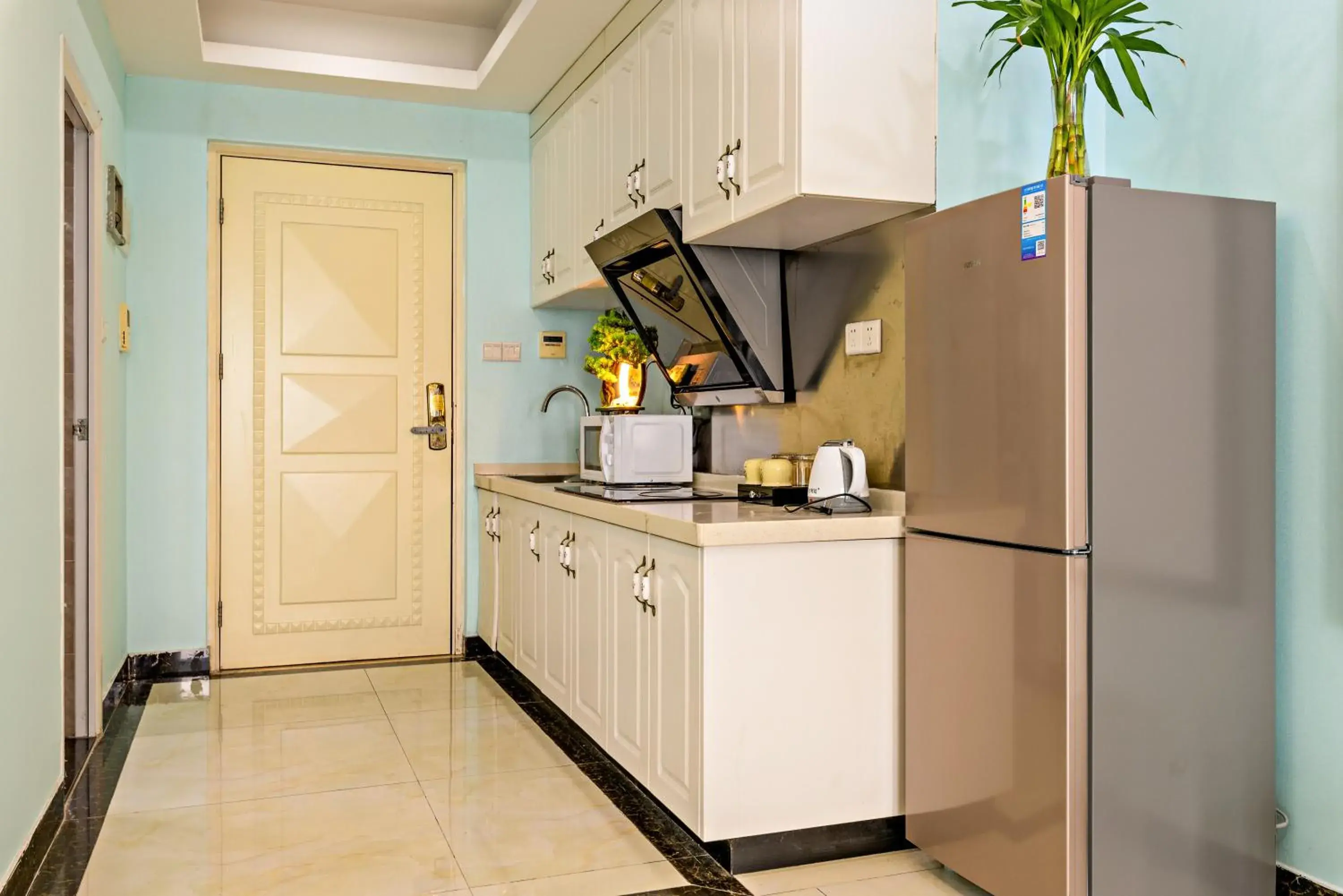 Kitchen or kitchenette, Kitchen/Kitchenette in Guangzhou Manhattan International Apartment Zhengjia Branch