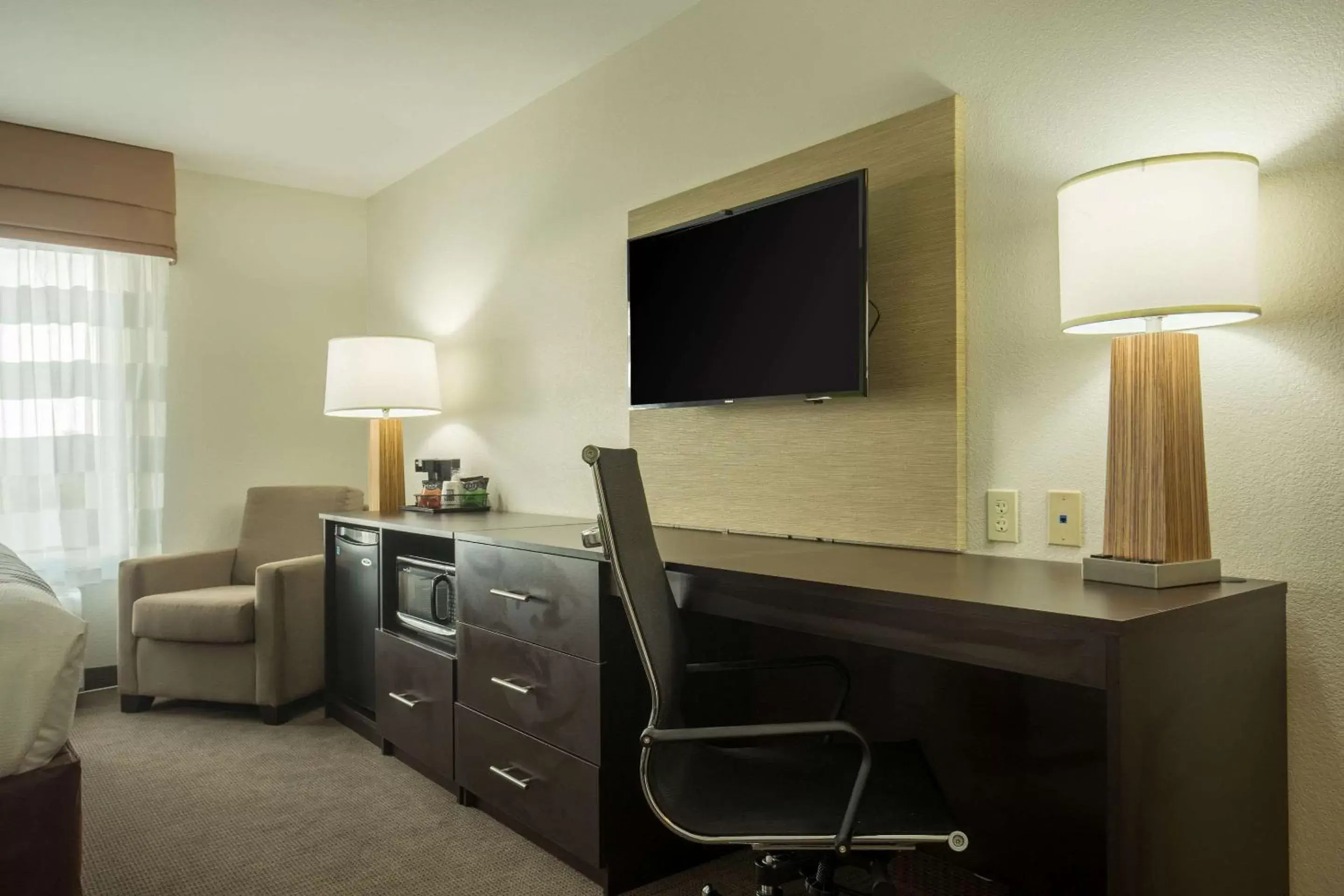 Photo of the whole room, TV/Entertainment Center in Sleep Inn & Suites