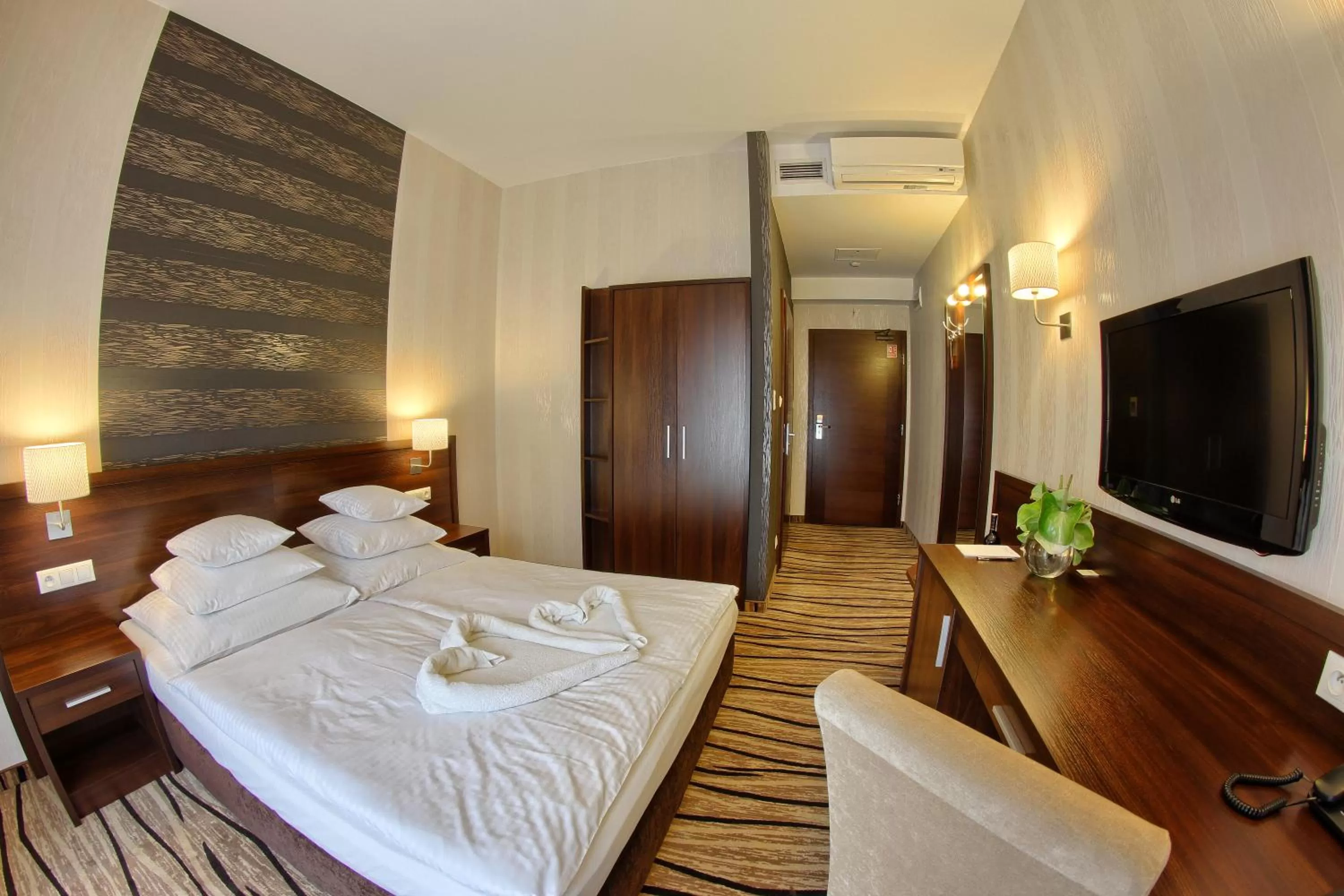 Bed in Hotel Arkas