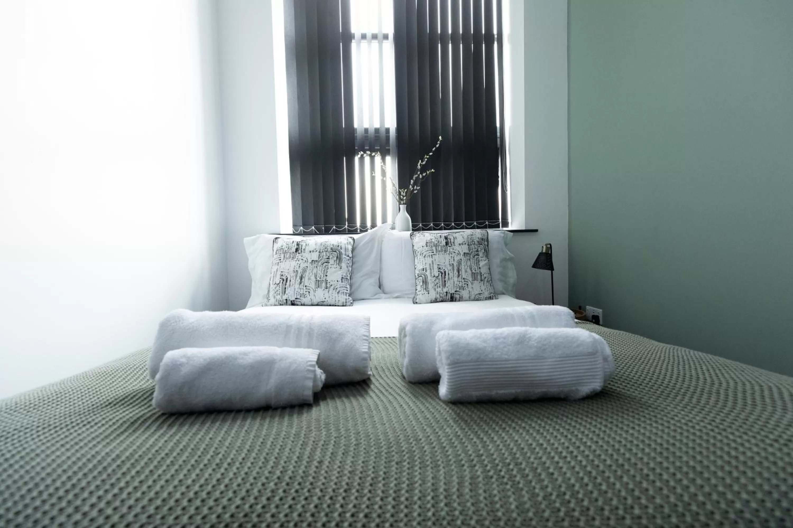 Bed in Spire Accommodations Ltd