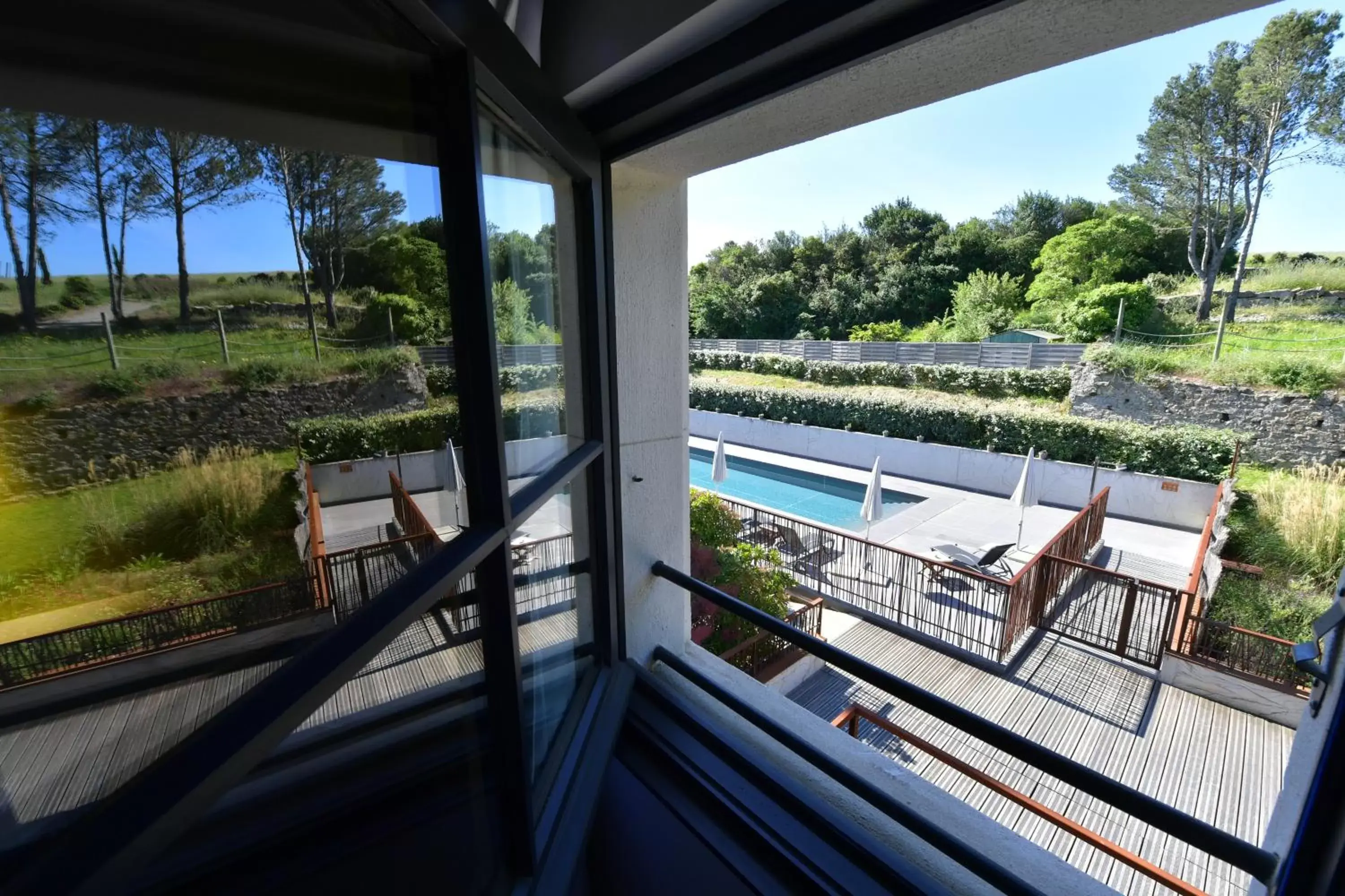 Shower, Pool View in Hotel Pont Levis - Franck Putelat