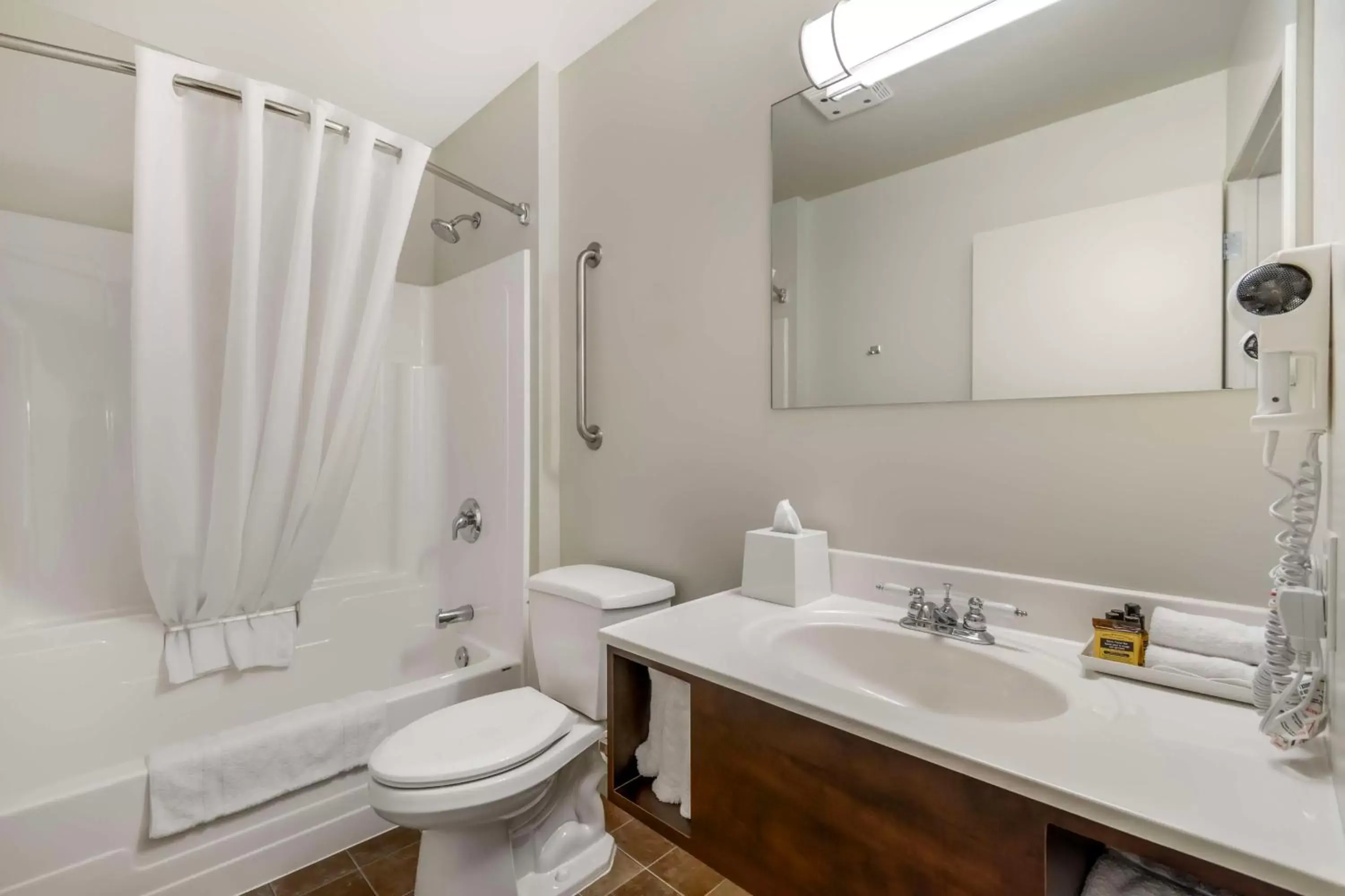 Bathroom in Villa Inn & Suites - SureStay Collection by Best Western