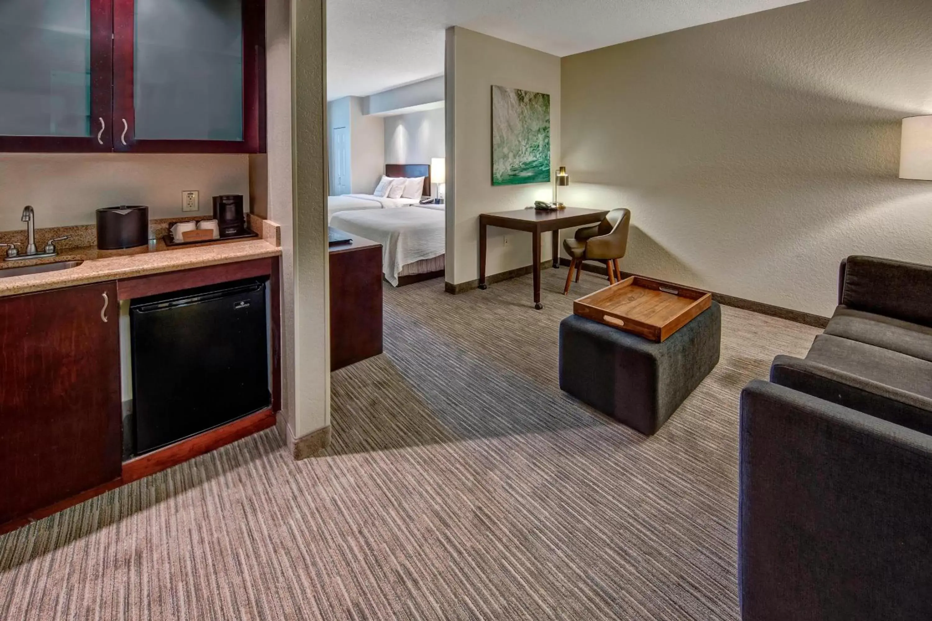 Living room, Kitchen/Kitchenette in SpringHill Suites by Marriott Naples