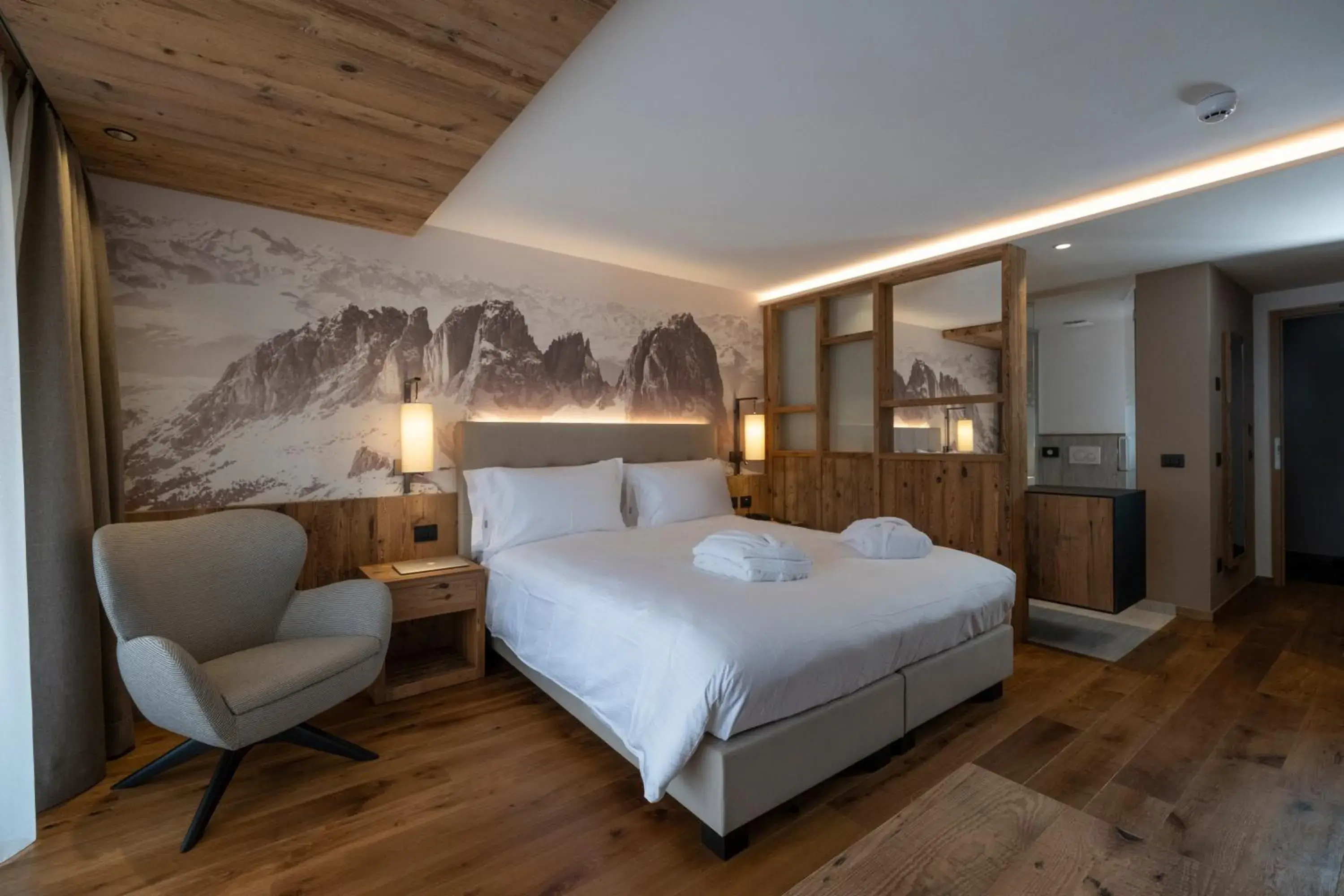Bed in Ciampedie Luxury Alpine Spa Hotel