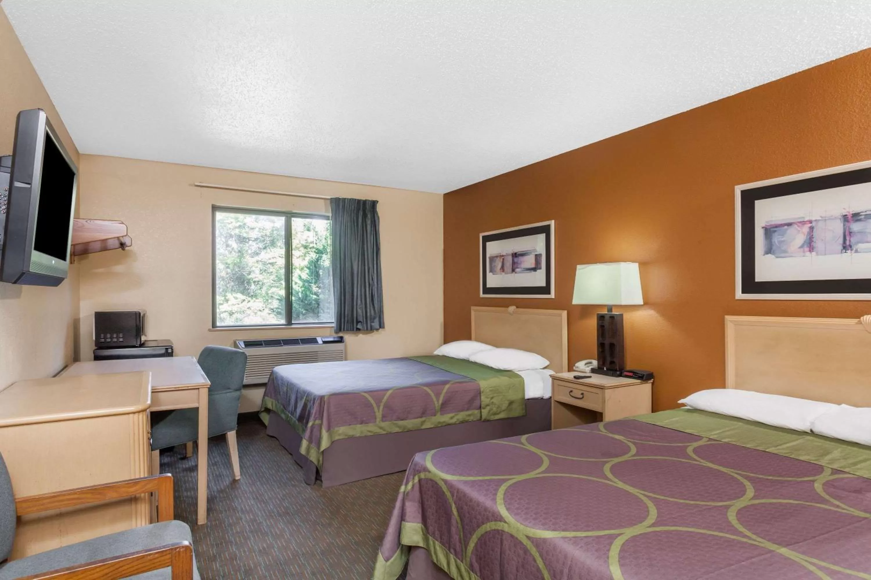 Photo of the whole room in Super 8 by Wyndham Charlotte/Amusement Park Area
