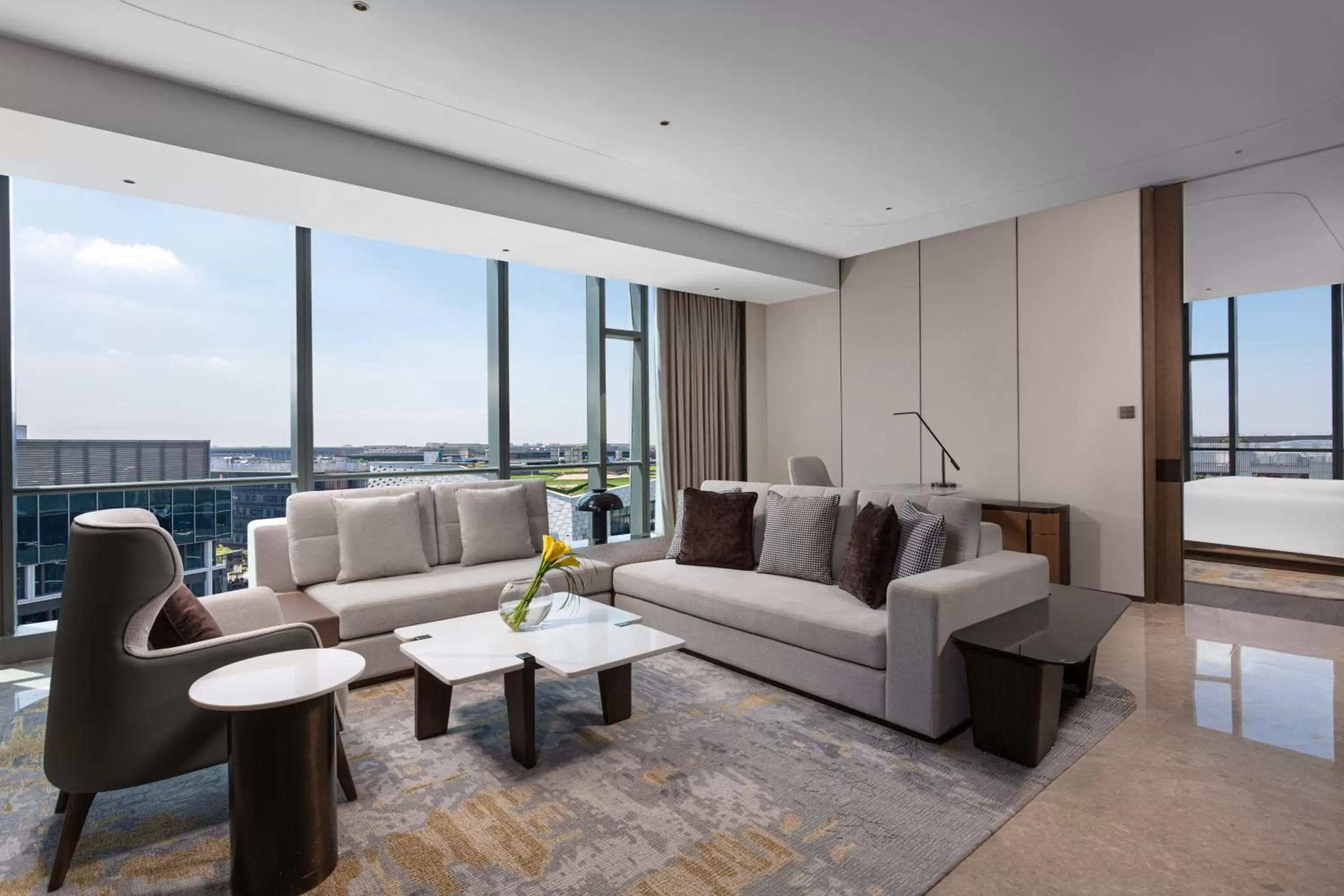 Living room, Seating Area in Crowne Plaza Shanghai Hongqiao, an IHG Hotel