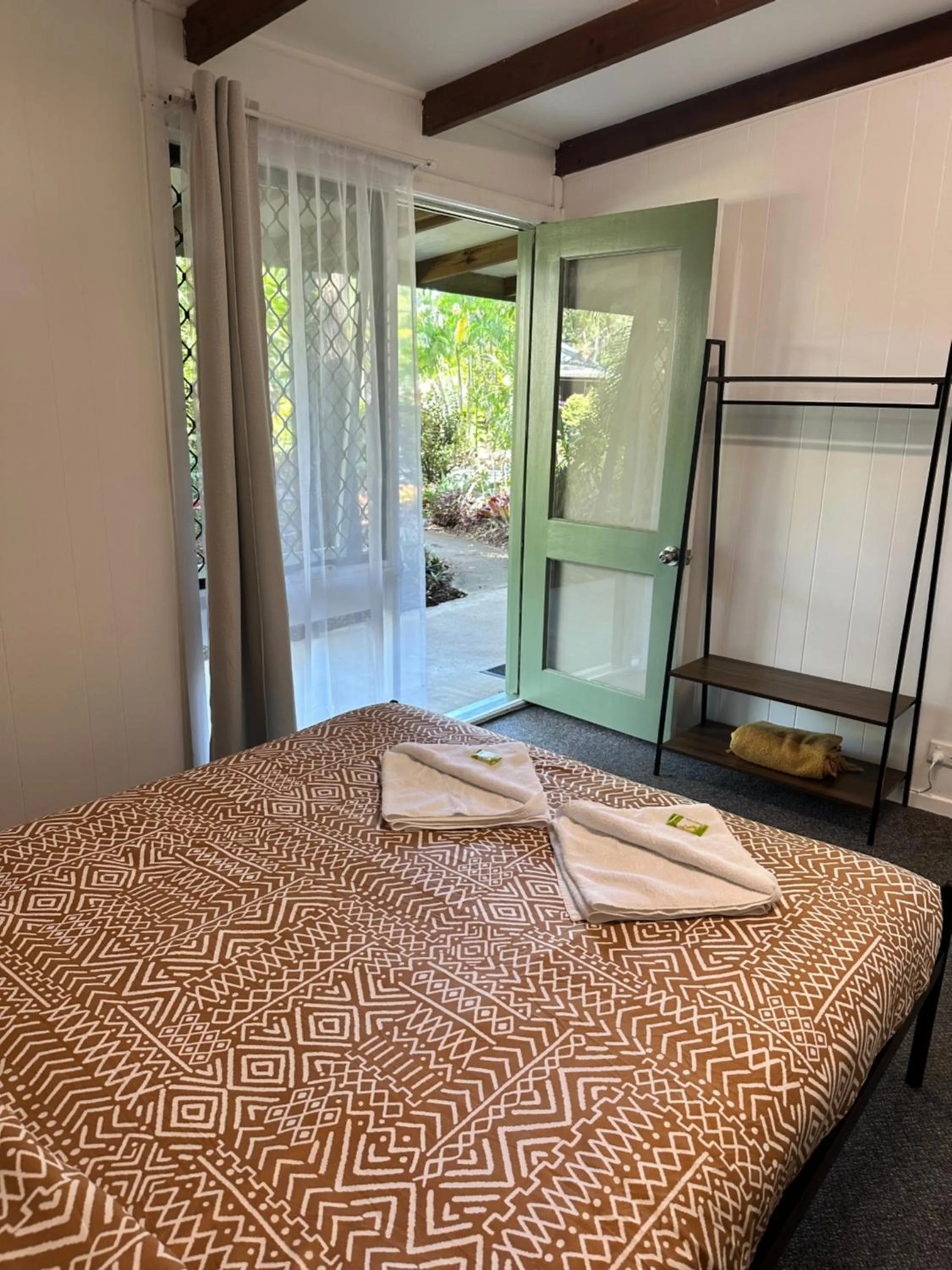 Bed in Colonial Village Resort