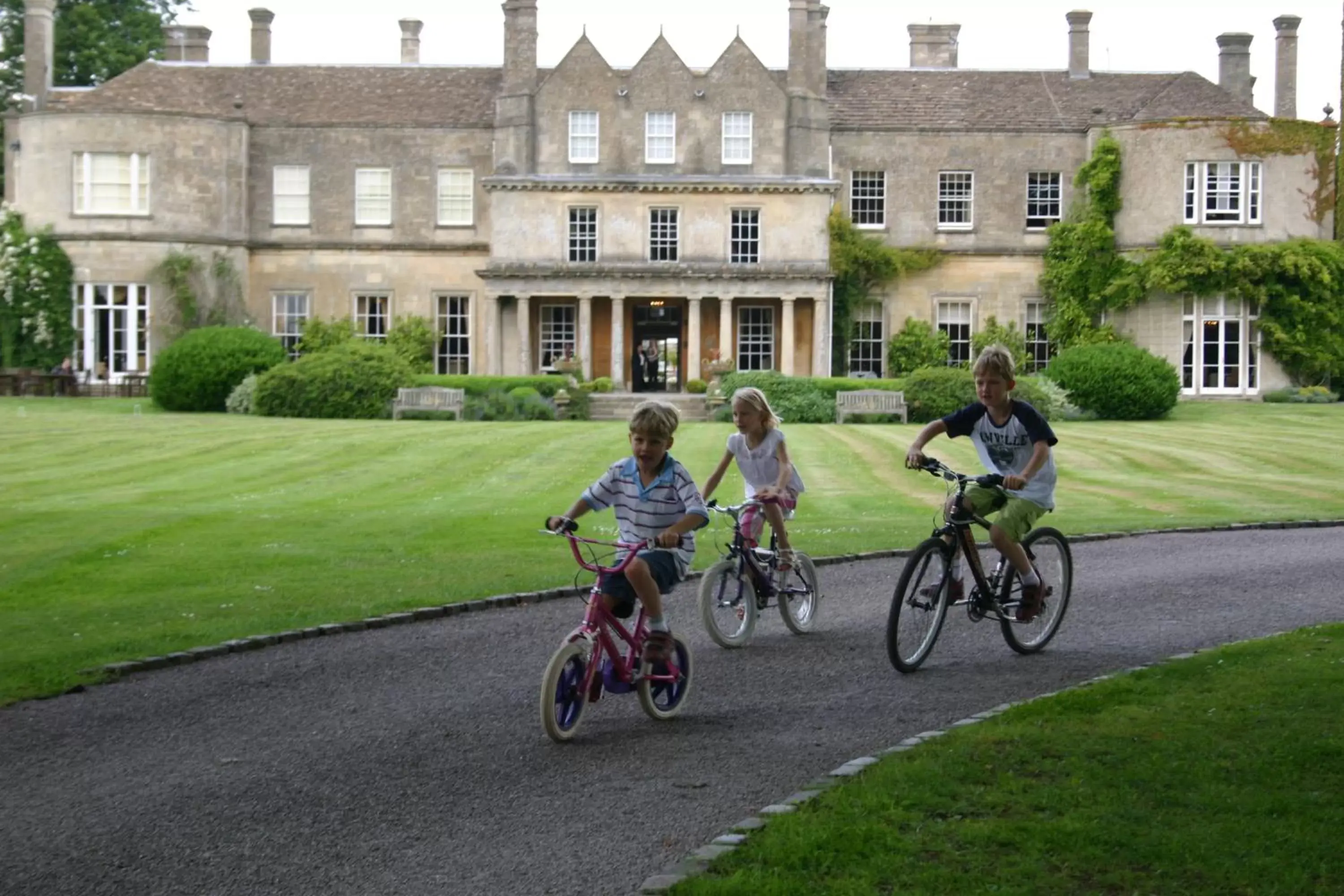 group of guests, Biking in Lucknam Park Hotel